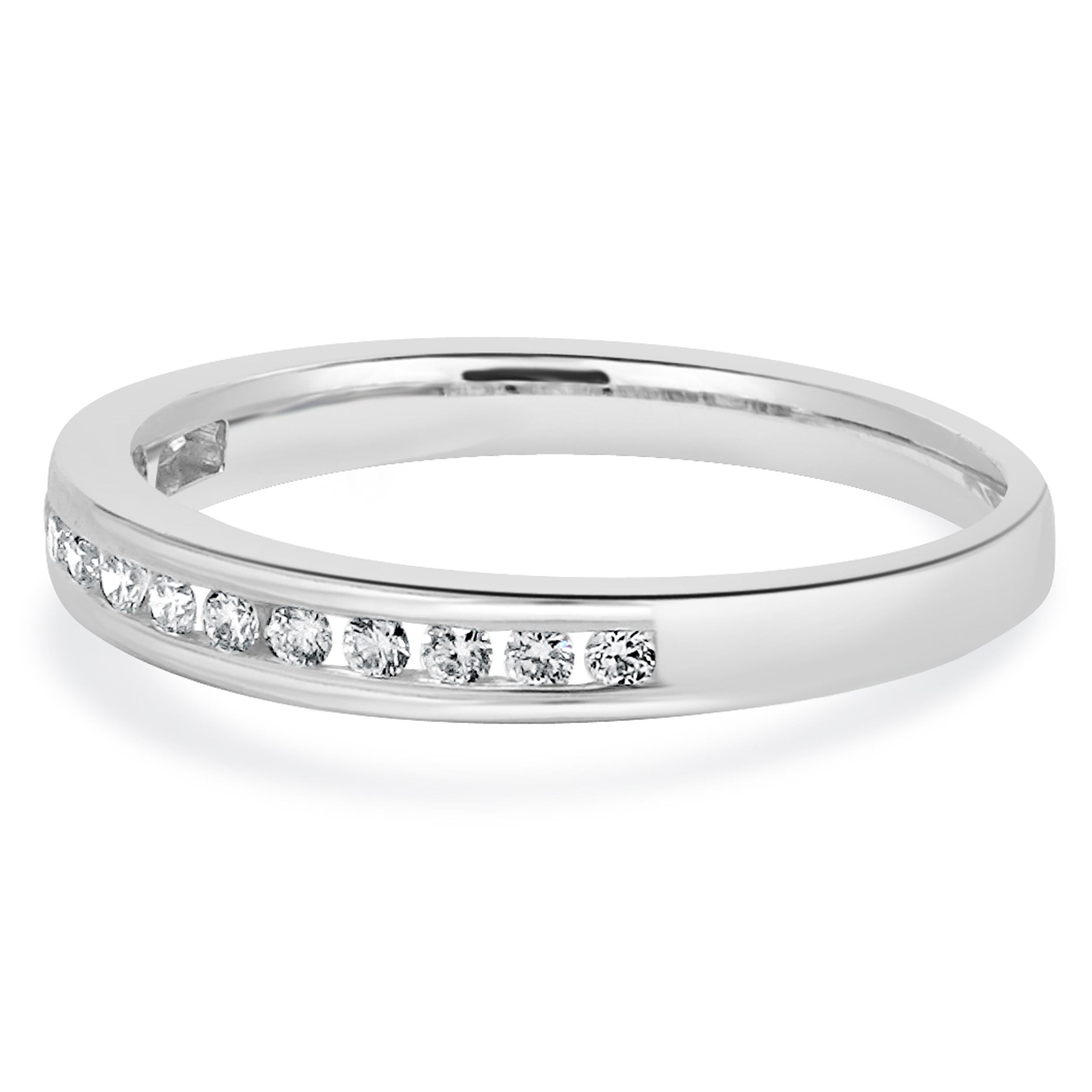 Designer: custom
Material: 14K white gold
Diamond: 15 round brilliant cut = 0.15cttw
Color: H
Clarity: SI1
Ring size: 7.25 (please allow two additional shipping days for sizing requests)
Weight: 2.24 grams
