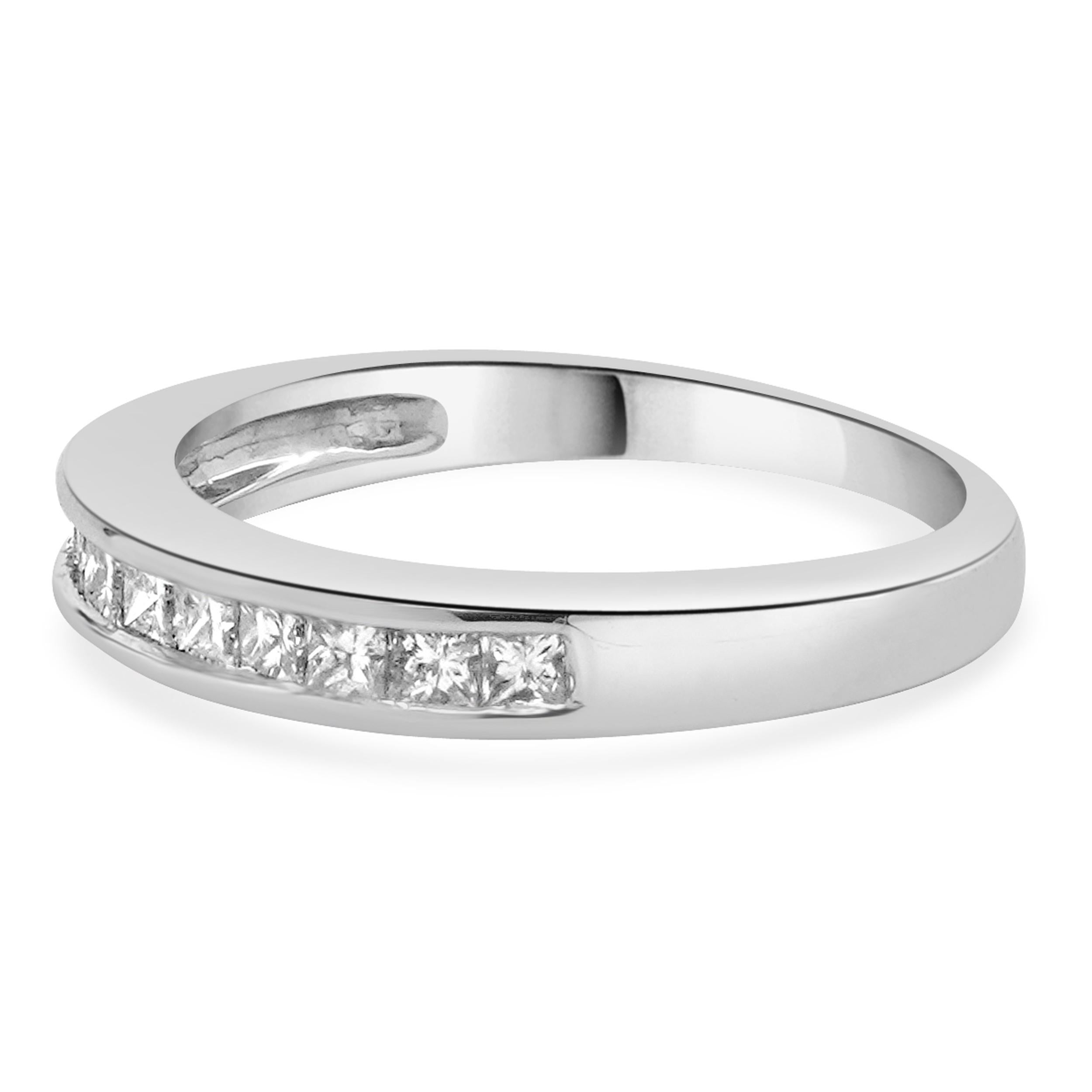 Designer: custom
Material: 14K white gold
Diamond:  10 princess cut = 0.60cttw
Color: H
Clarity: SI2-I1
Ring size: 7 (please allow two additional shipping days for sizing requests)
Weight: 3.50 grams
