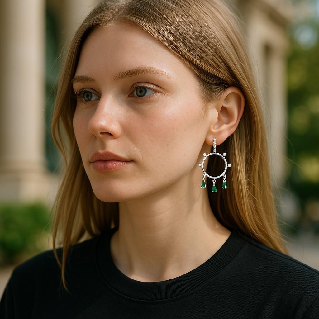 Elevate your elegance with our exquisite 14 Karat White Gold Circle Hoop Earrings, meticulously designed to captivate and enchant. These stunning earrings combine timeless sophistication with a modern twist, making them the perfect addition to any