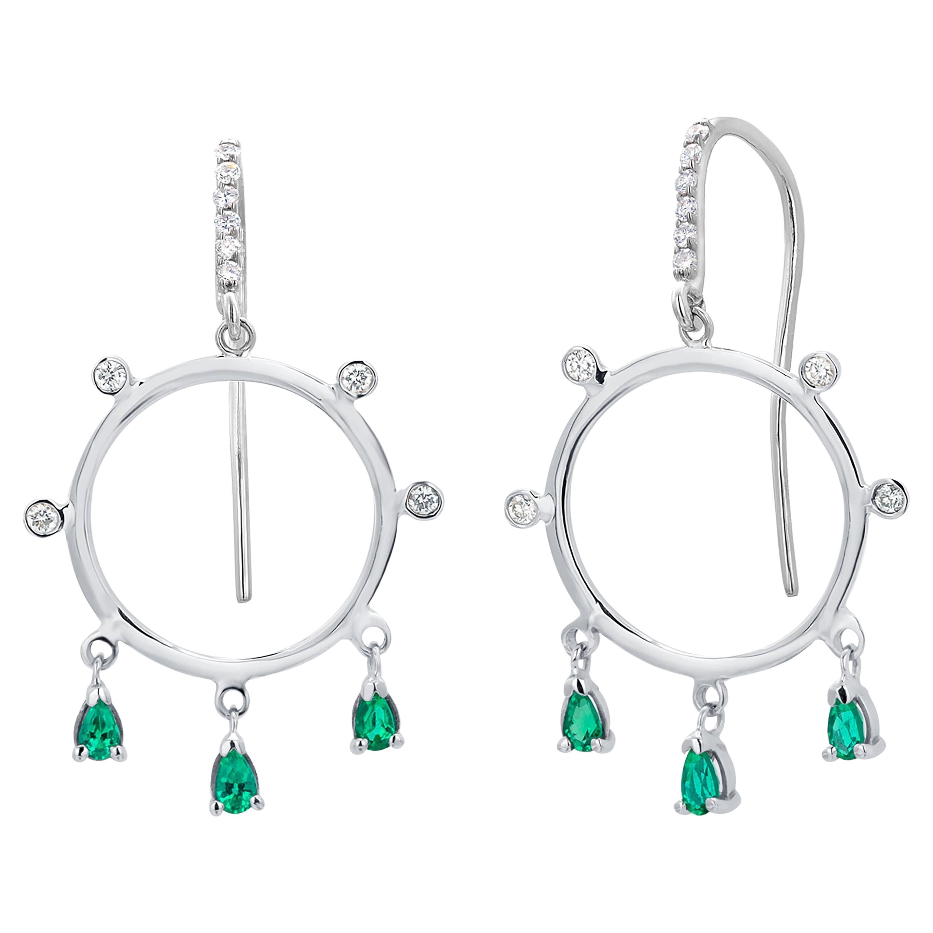 14 Karat White Gold Circle Hoop 1.65 Inch Earrings with Emeralds and Diamonds For Sale