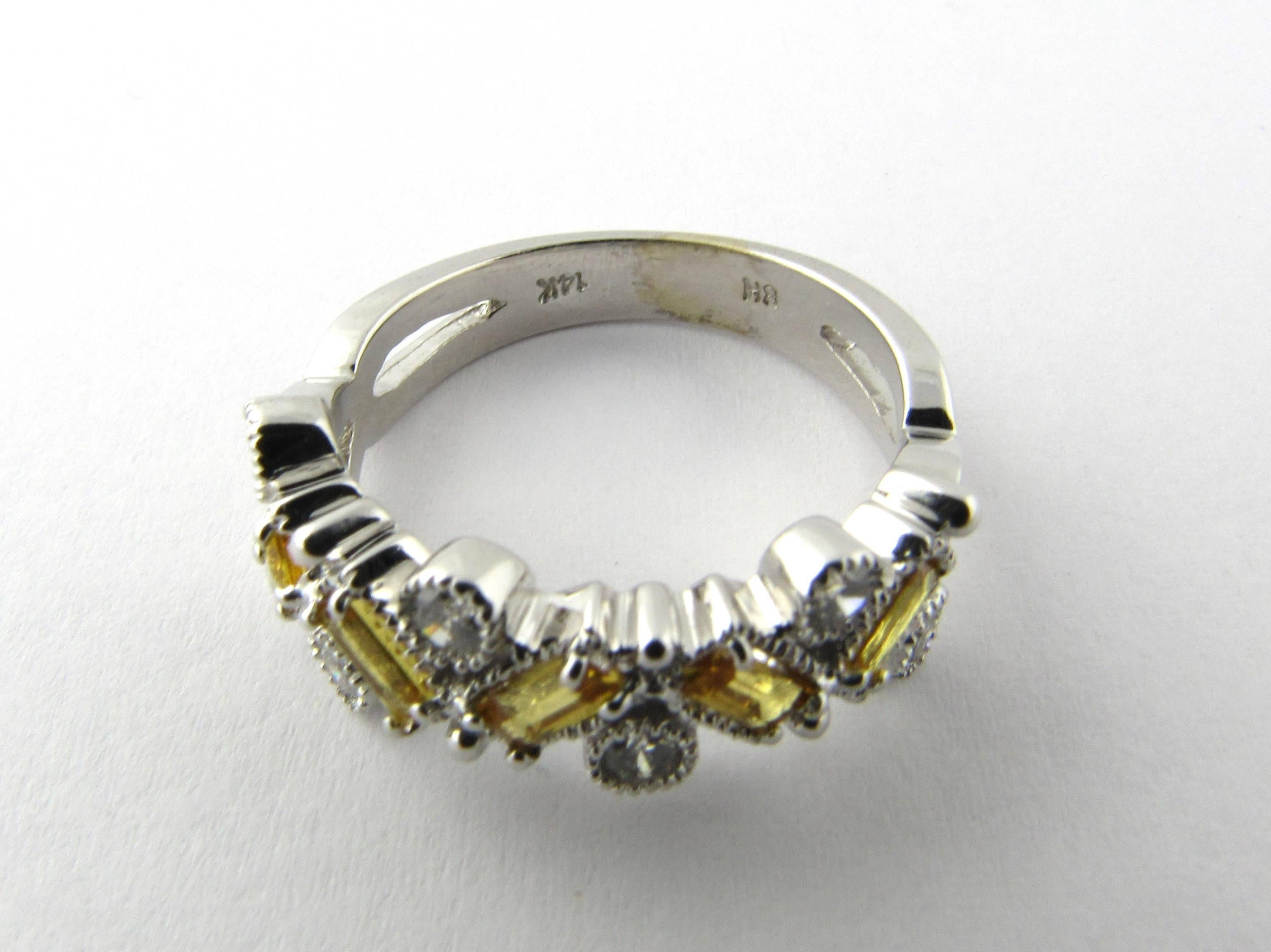 Vintage 14 Karat White Gold Yellow Natural Sapphire and Diamond Ring Size 7.75- 
This stunning ring features five baguette natural yellow sapphires and six round brilliant cut diamonds set in meticulously detailed 14K white gold. 
Approximate total