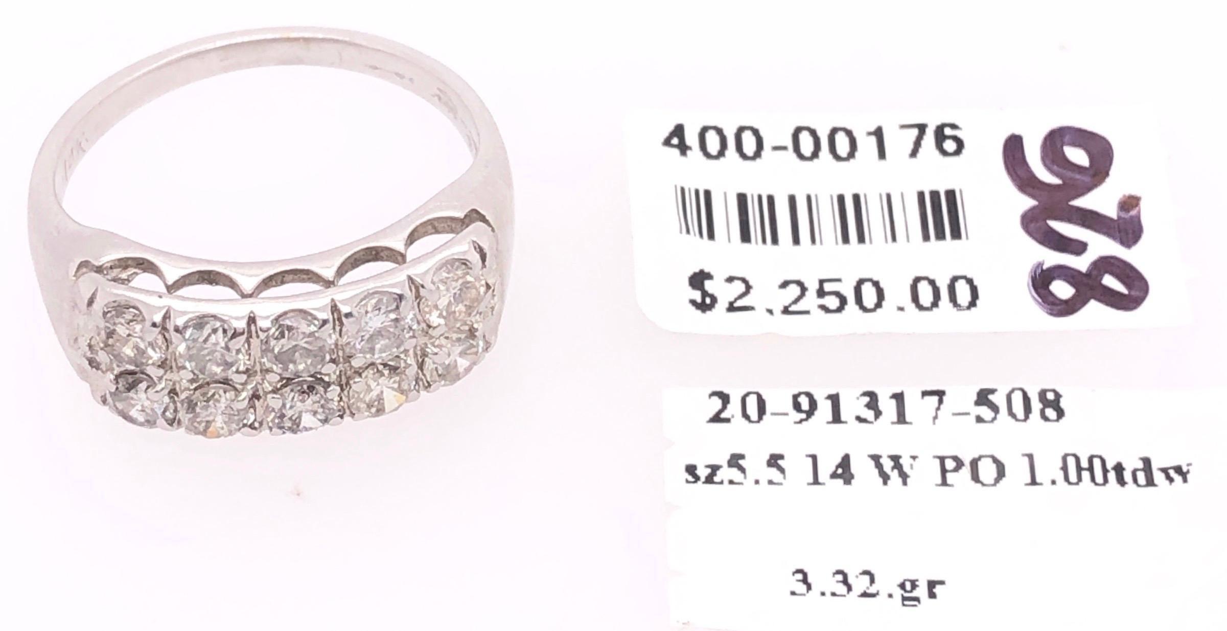 14 Karat White Gold Contemporary Diamond Band Bridal Ring 1.00 Total Diamond Weight.
Size 5.5
3.32 grams total weight.