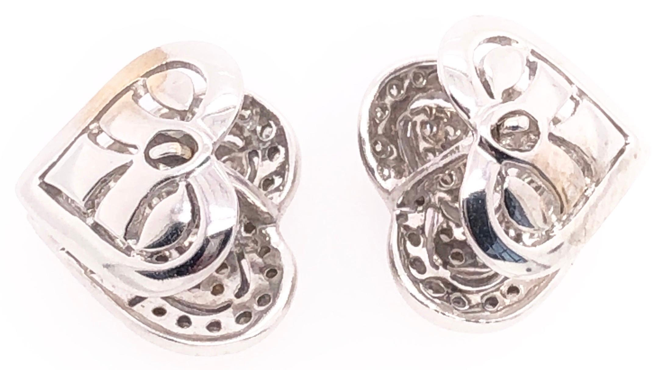 14 Karat White Gold Contemporary Heart Earrings with Diamonds.
0.50 Total Diamond Weight.
4.20 grams total weight.
