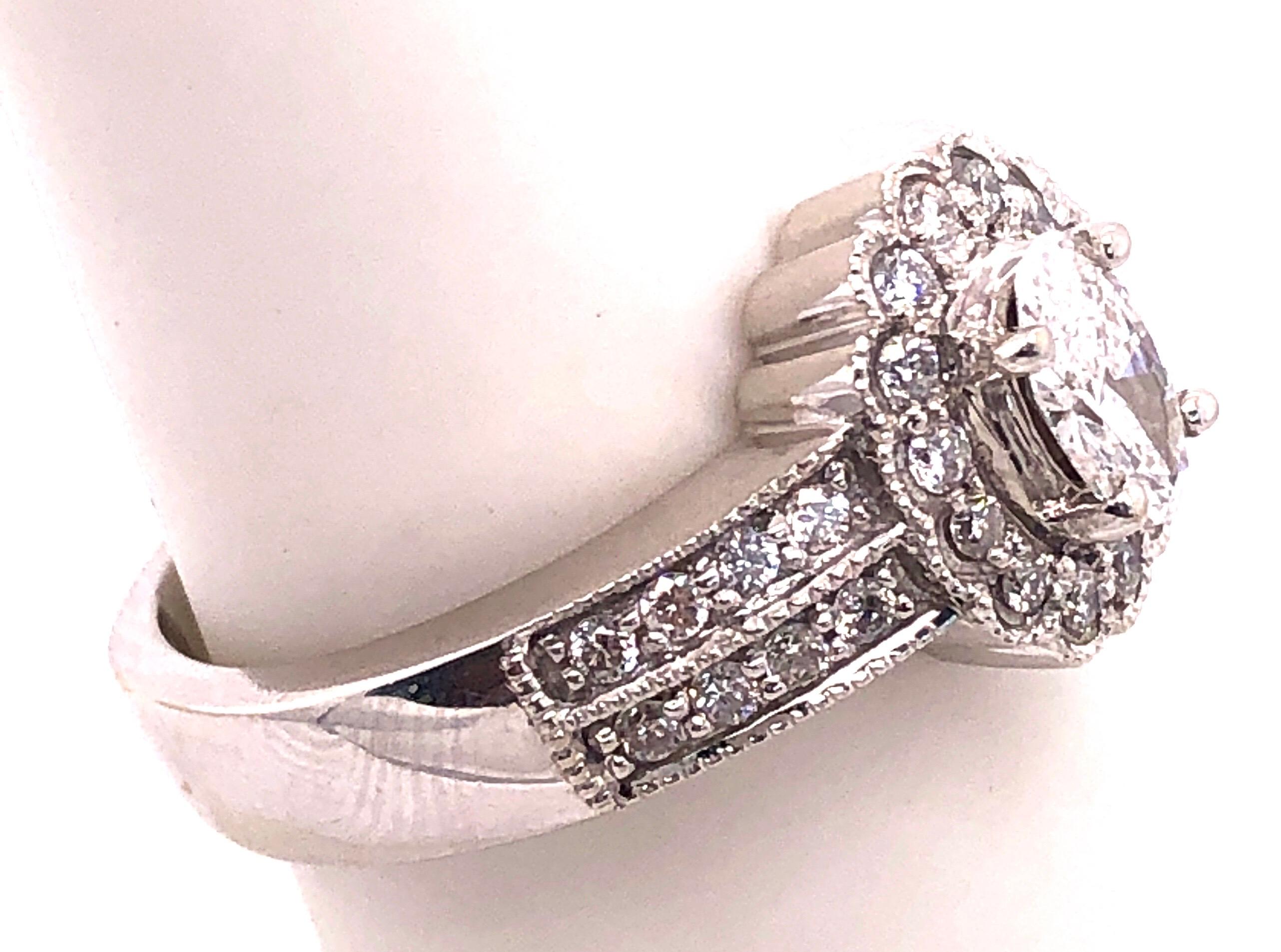 14 Karat White Gold Contemporary Ring with Diamonds 1.00 Total Diamond Weight.
Size 7
6 grams total weight.