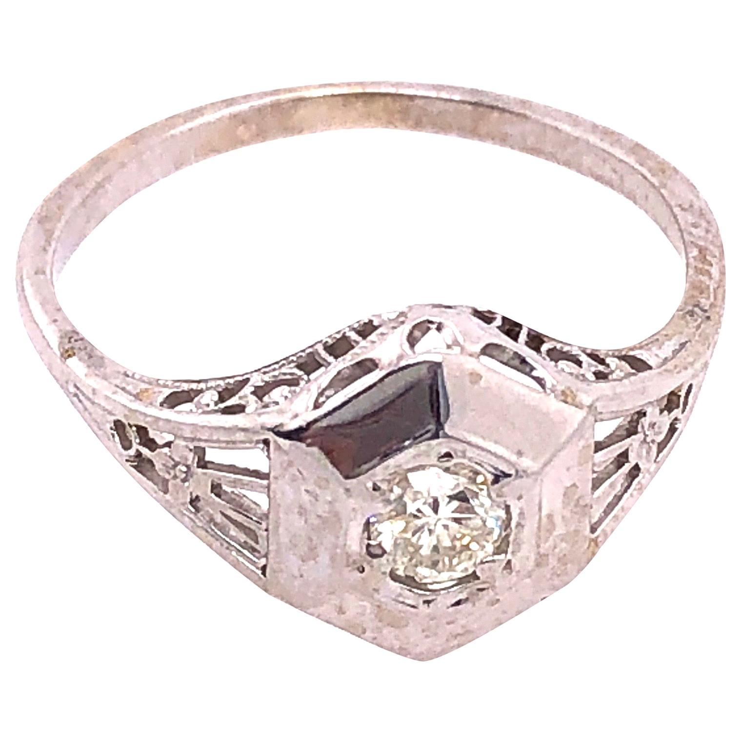 14 Karat White Gold Contemporary Ring with Round Diamond For Sale