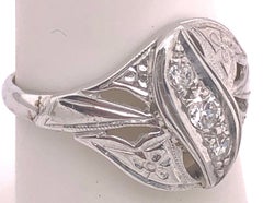 14 Karat White Gold Contemporary Ring with Three Round Diamonds