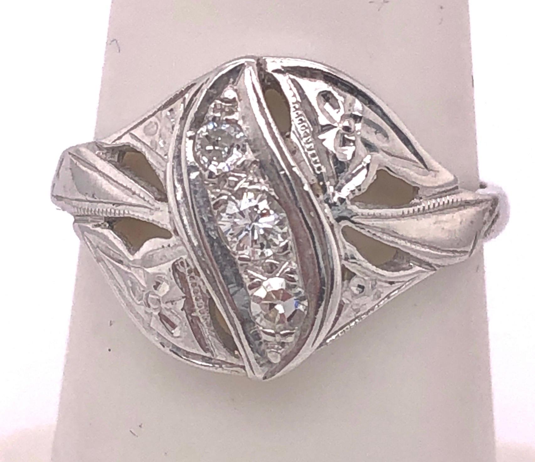 Modern 14 Karat White Gold Contemporary Ring with Three Round Diamonds For Sale