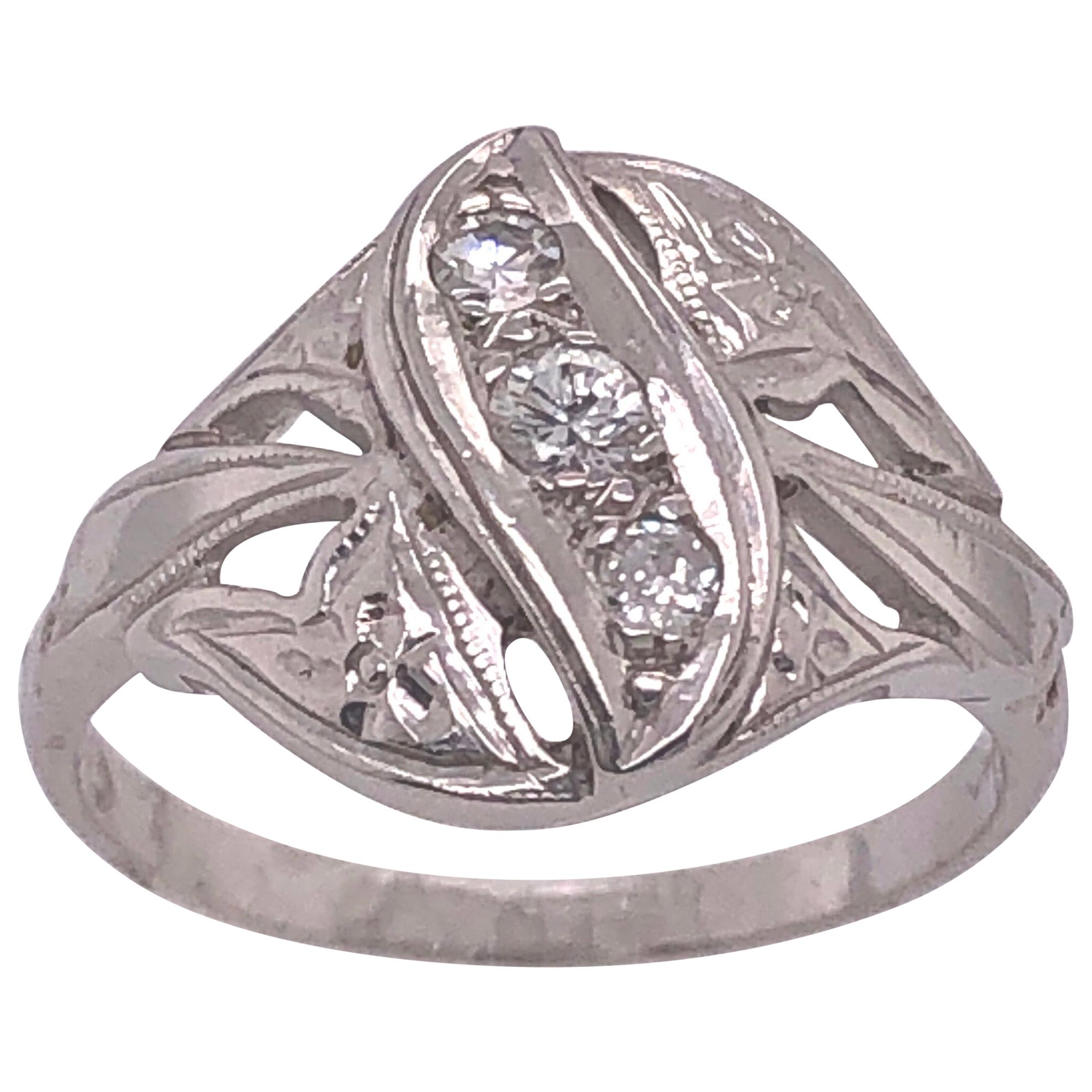14 Karat White Gold Contemporary Ring with Three Round Diamonds For Sale