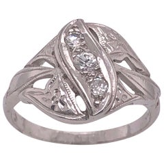 14 Karat White Gold Contemporary Ring with Three Round Diamonds