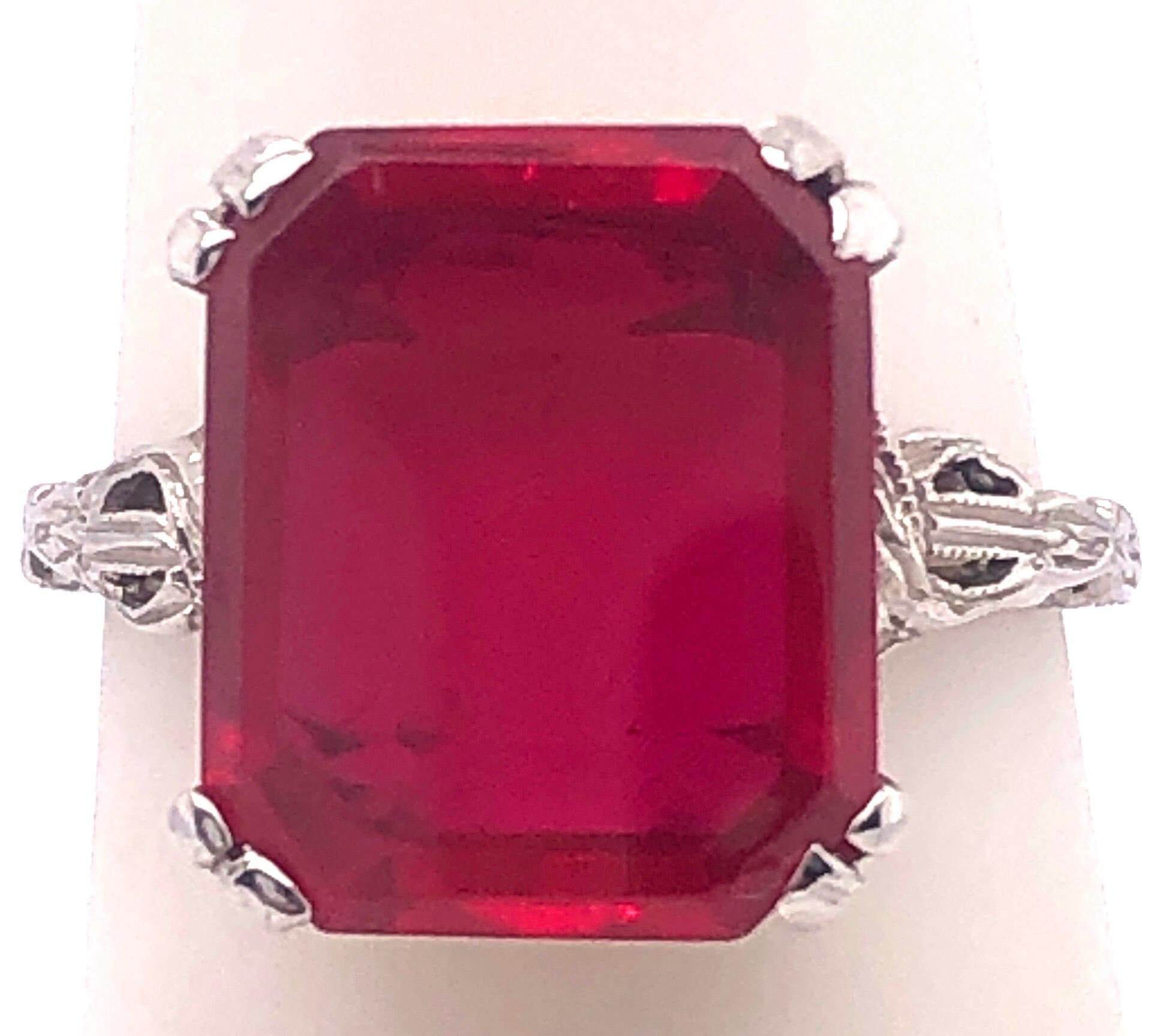 14 Karat White Gold Contemporary Ruby style Ring.
Size 4.5
3.10 grams total weight.