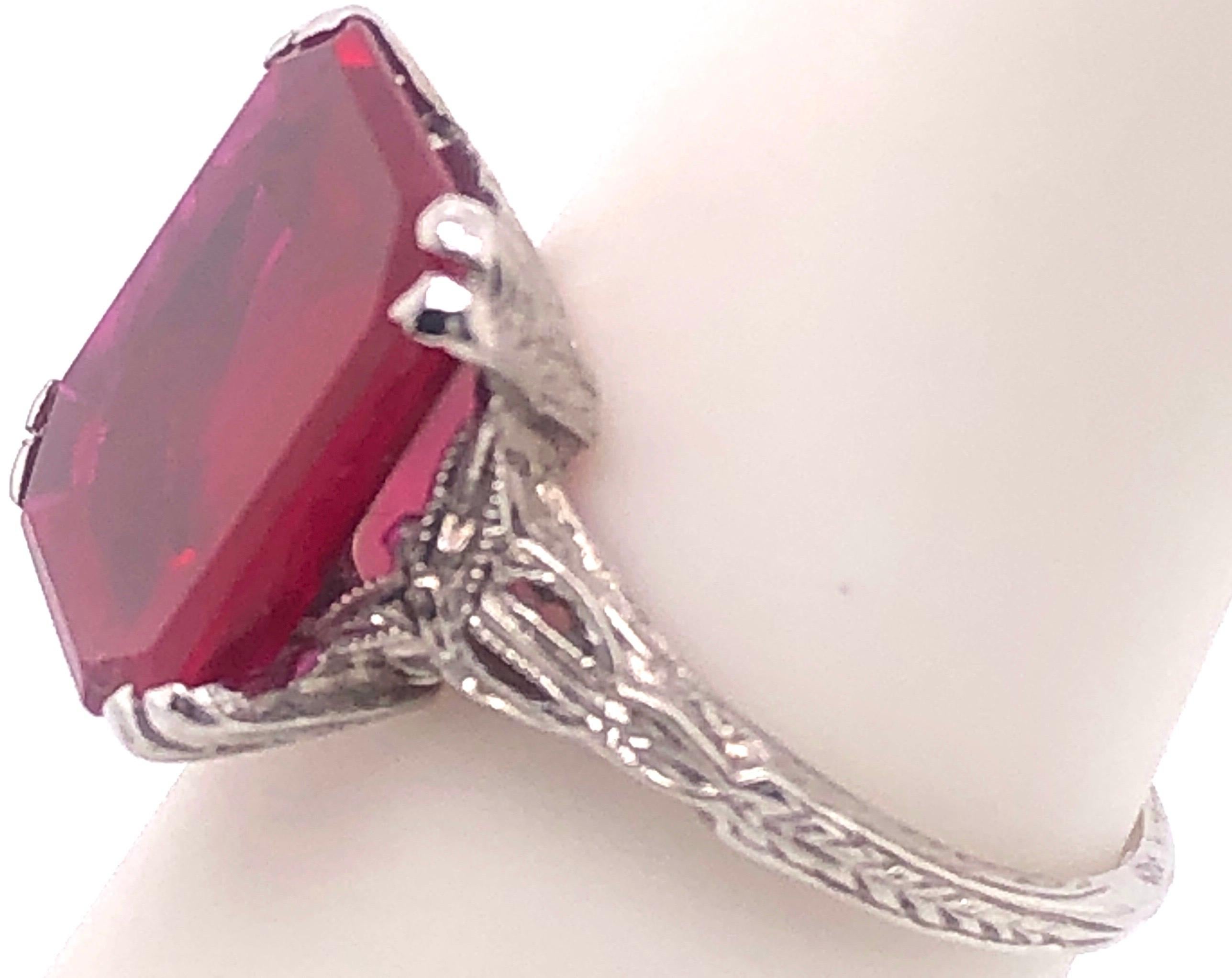 Modern 14 Karat White Gold Contemporary Ruby Style Ring For Sale