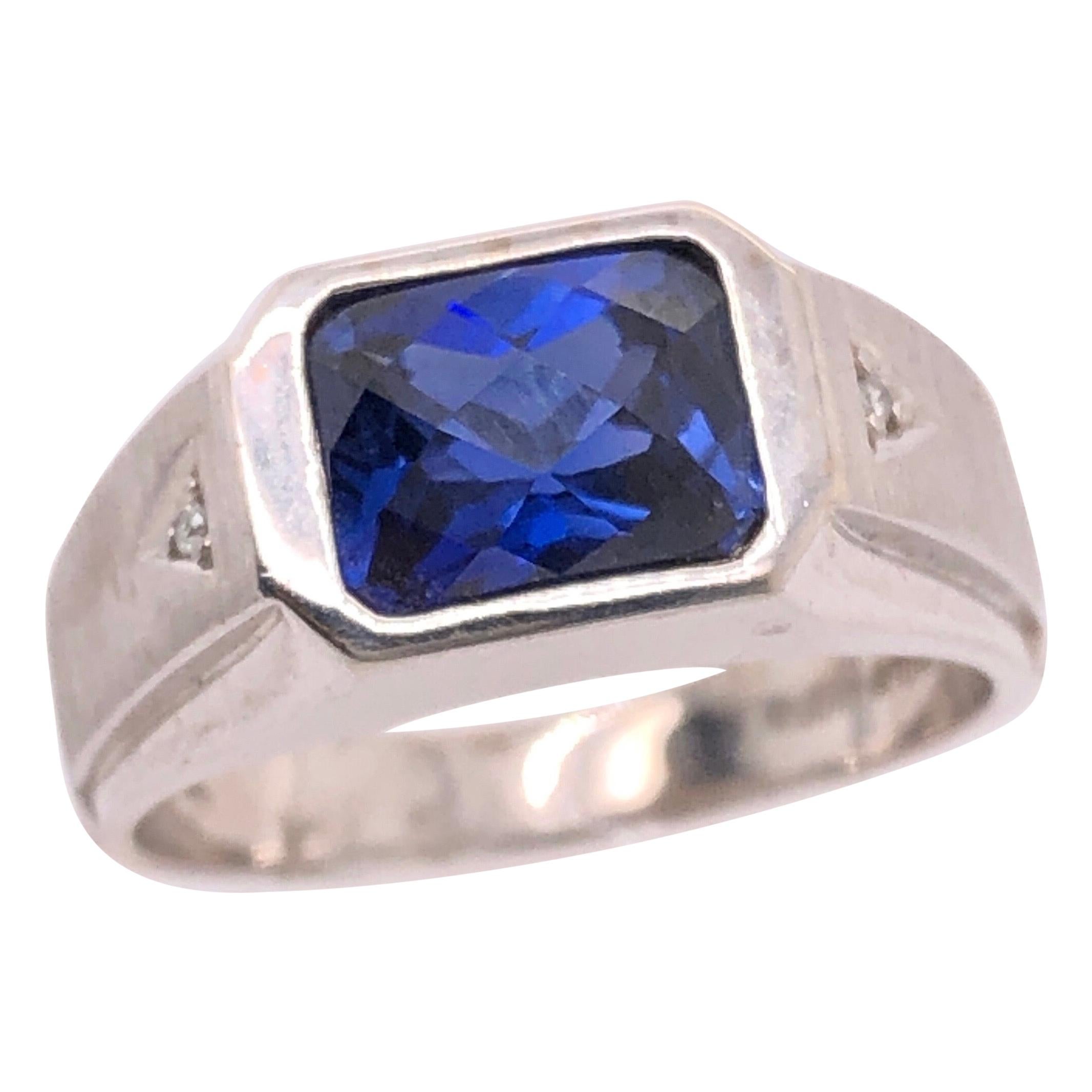 14 Karat White Gold Contemporary Sapphire Ring with Diamond Accents