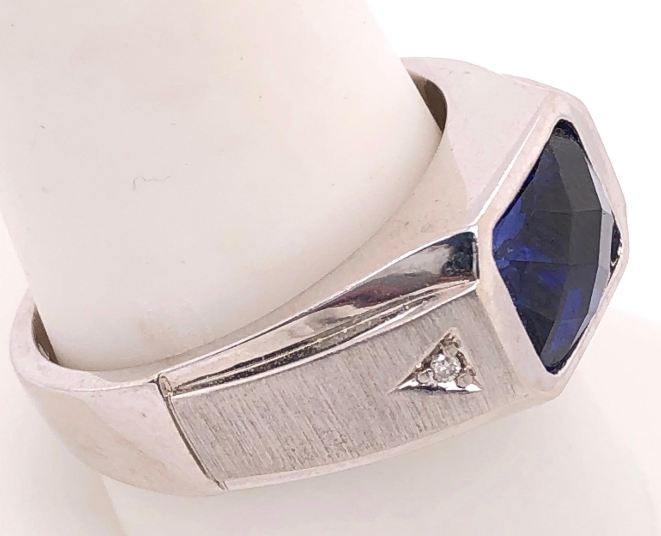 14 Karat White Gold Contemporary Sapphire Ring with Diamond Accents 1