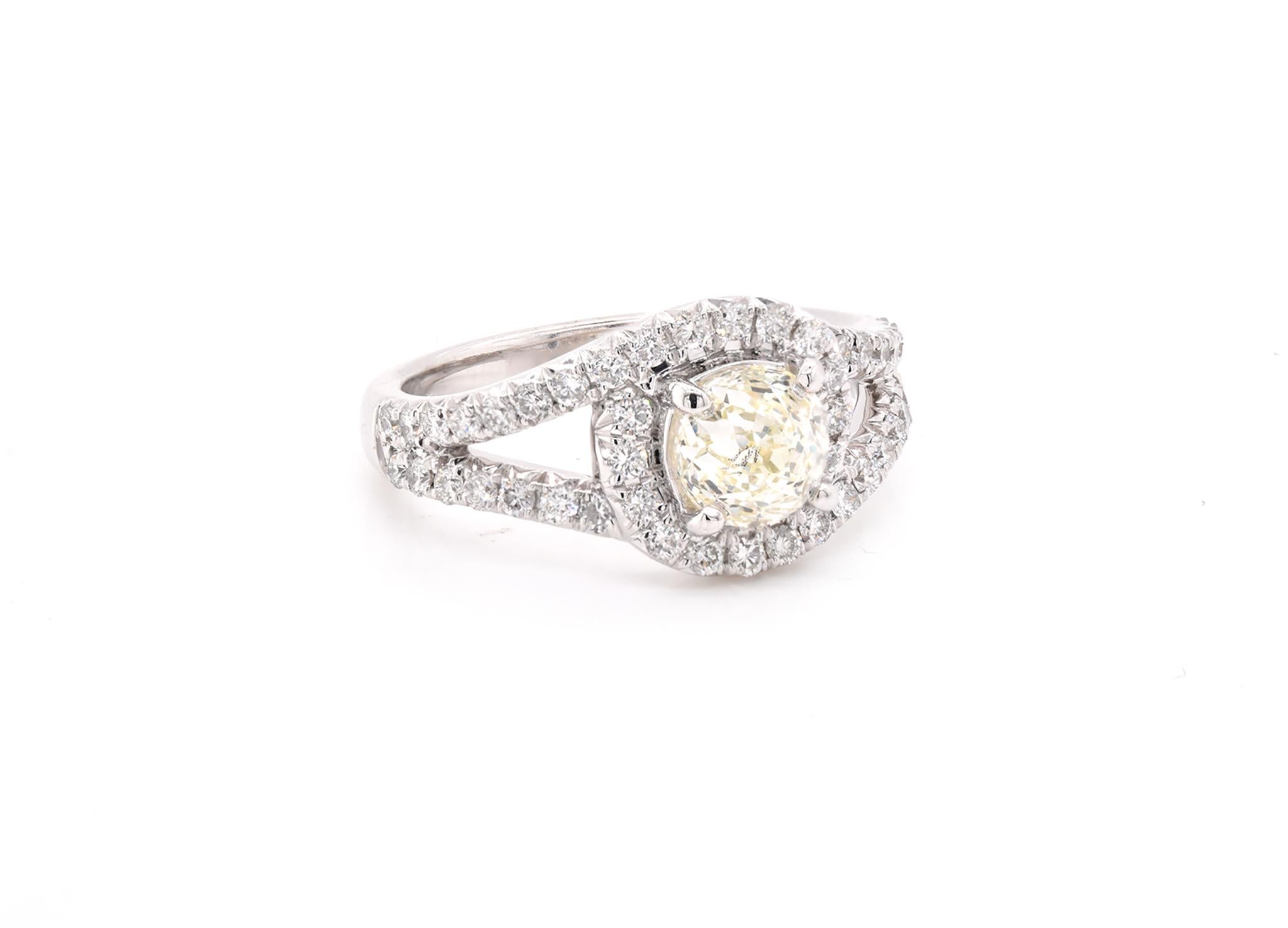 Material: 14K white gold
Center Diamond: 1 crown of light cut = 1.06ct
Color: K
Clarity: SI3
Diamond: 46 round cut = .61cttw
Color: G
Clarity: VS
Ring Size: 6.5 (please allow up to 2 additional business days for sizing requests)
Dimensions: ring
