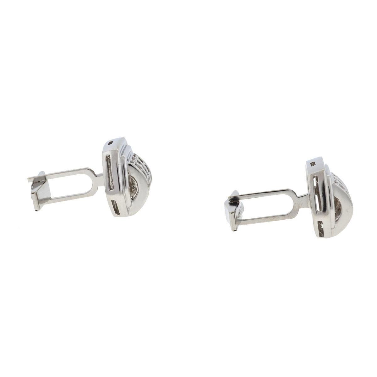 Company-N/A
Style-Cufflink With Three Tiny Rows of Diamonds 
Metal-14k White Gold
Stones-Diamonds - approx. .60 cts tw (.30 Cts Each)
Size -25mm x 20mm
Weight-14.42G 
Includes-Cufflinks ONLY
Sku-7812-5OOM