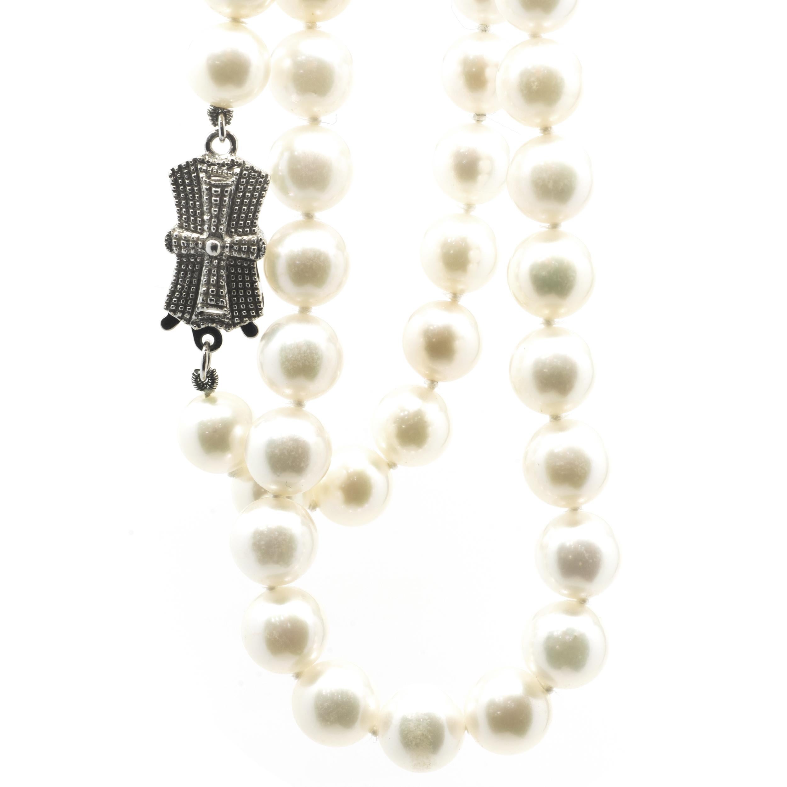 Designer: Custom
Material: 14K white gold
Pearl: cultured fresh water = 6.7mm
Dimensions: necklace measures 18-inches in length
Weight: 28.56 grams
