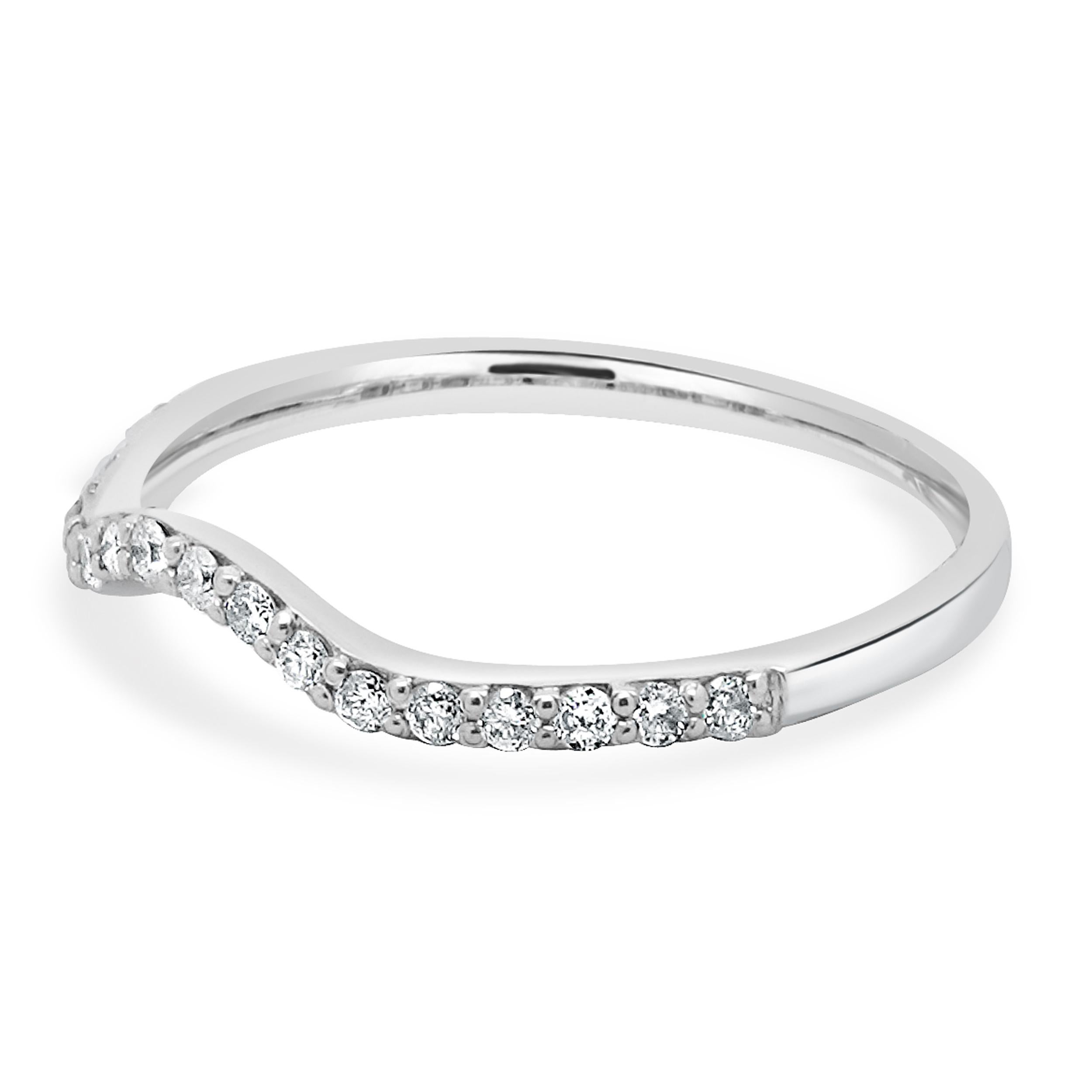 Designer: custom
Material: 14K white gold
Diamond: 16 round brilliant cut = 0.16cttw
Color: H
Clarity: I1
Ring size: 7 (please allow two additional shipping days for sizing requests)
Weight: 1.20 grams
