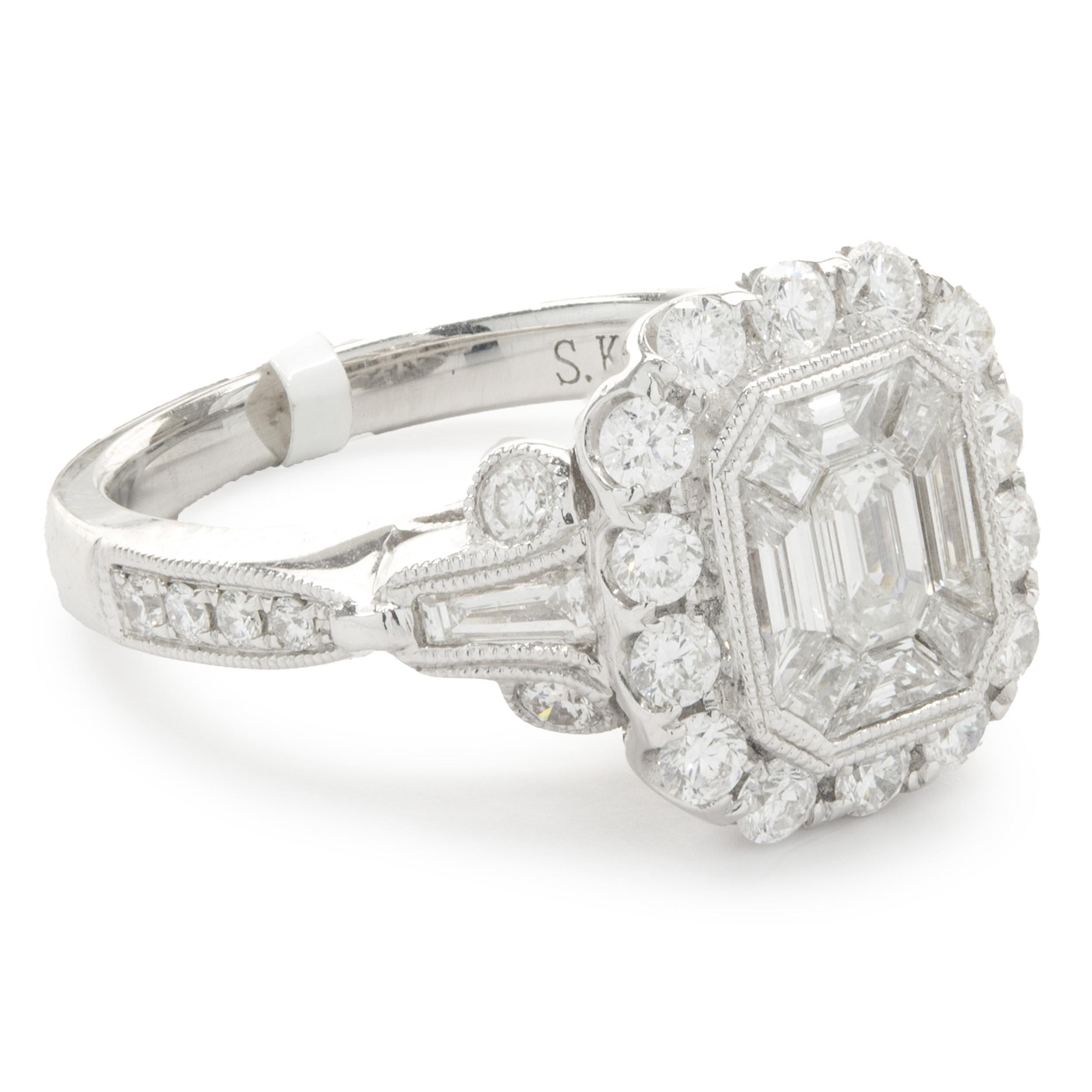 Designer: custom
Material: 14K white gold
Diamond: round, baguette, and emerald cut = 1.22cttw
Color: G
Clarity: VS2
Ring size: 6.5 (please allow two additional shipping days for sizing requests)
Weight:  5.68 grams
