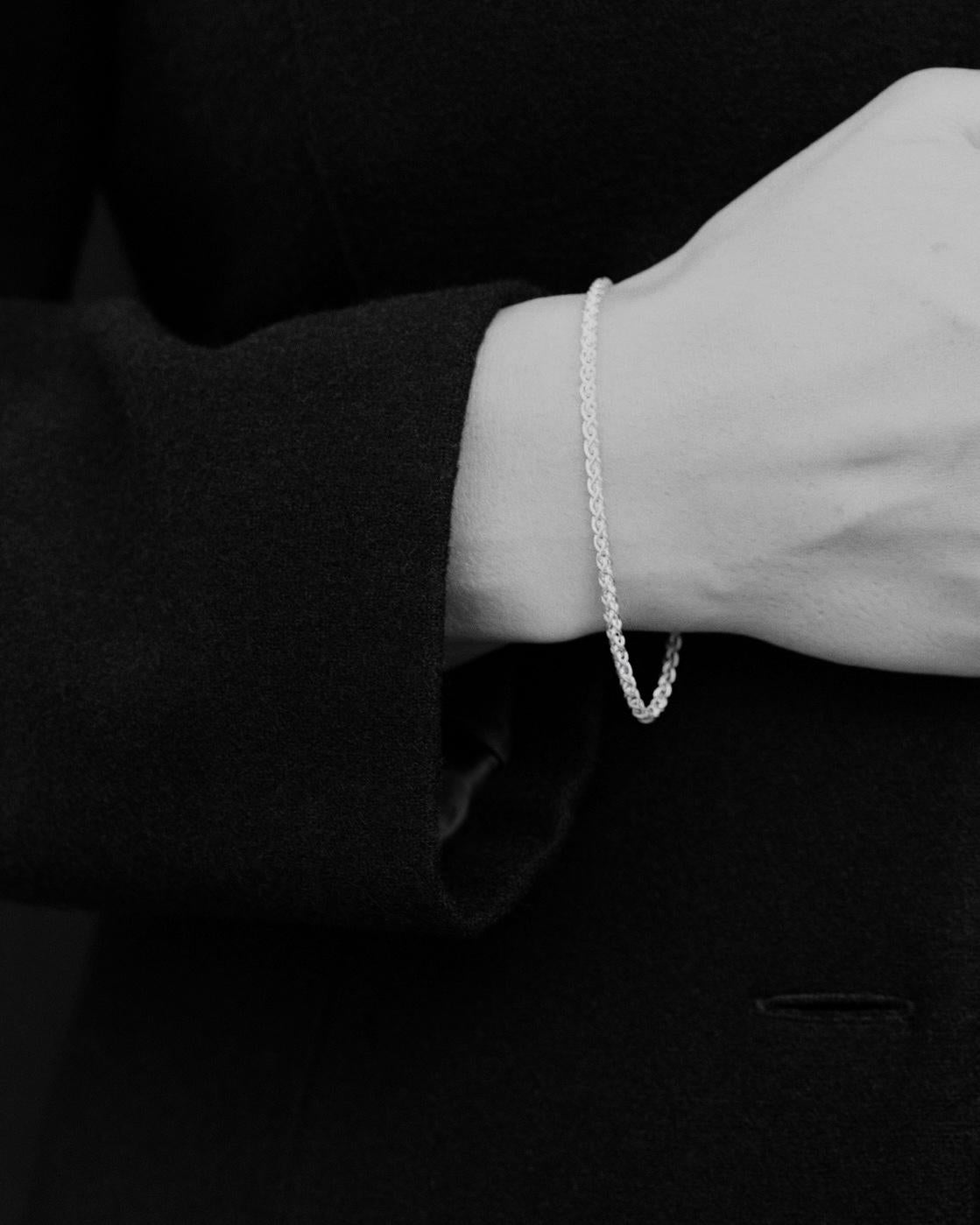 The Riding Chain exhibits elegant simplicity in a classic woven chain bracelet for daily wear. Made in Los Angeles from recycled 14 karat white gold. 

This chain bracelet is beautifully woven, creating an everyday piece that is both refined and