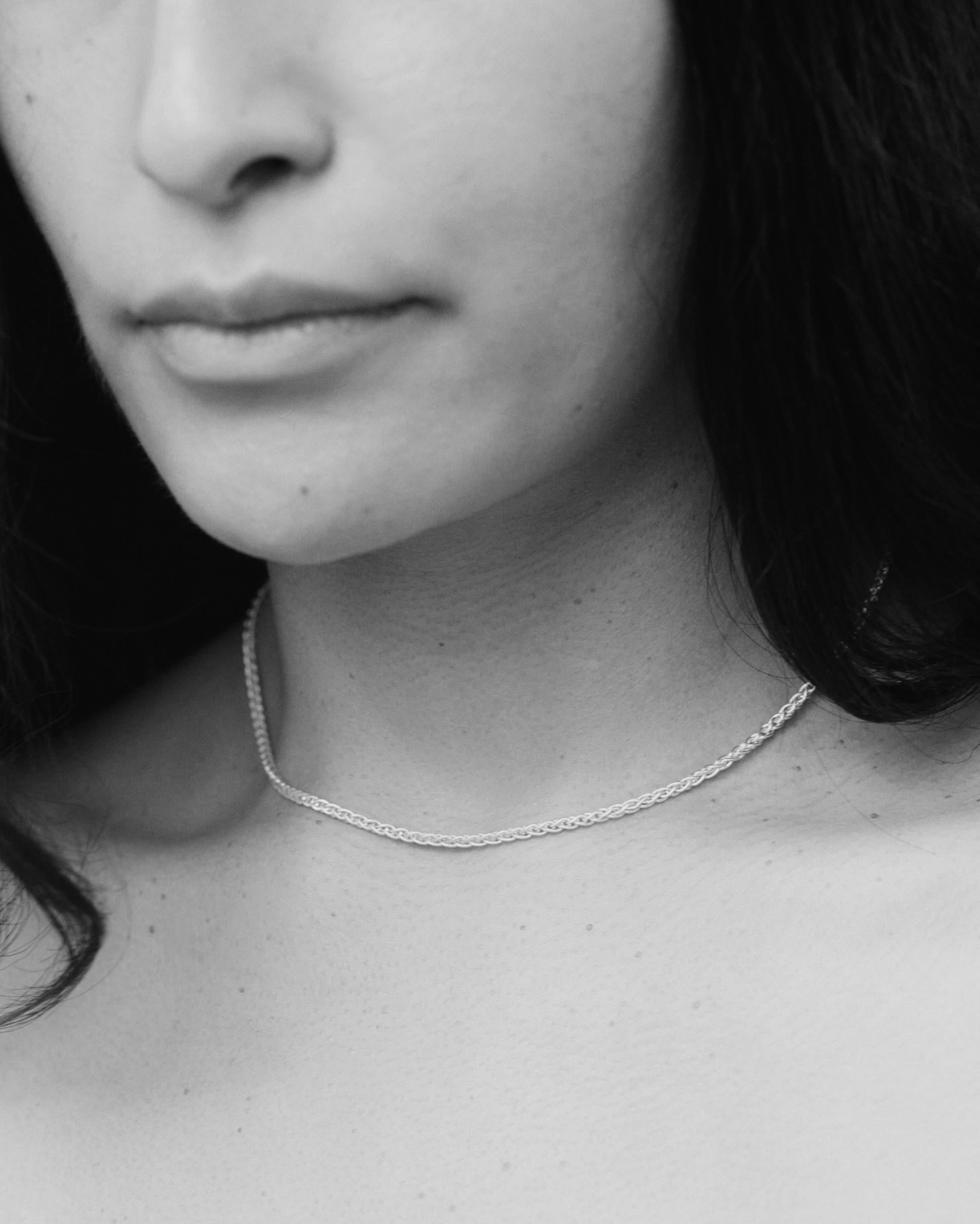 The Riding Chain exhibits elegant simplicity in a classic woven chain for daily wear. Made in Los Angeles from recycled 14 karat white gold. 

This chain is beautifully woven, creating an everyday piece that is both refined and resilient. It is 16