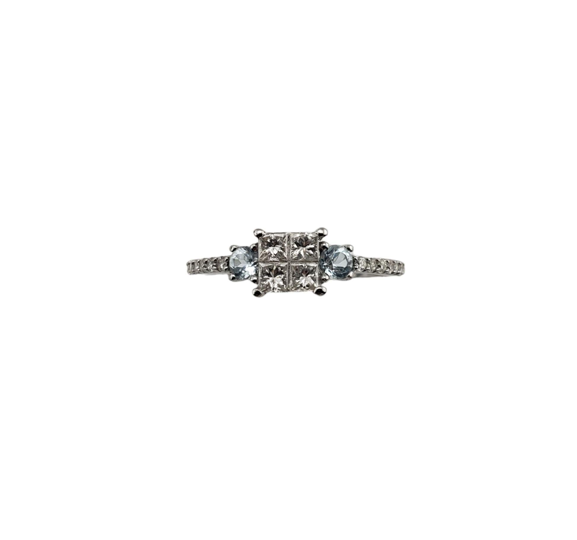 Vintage 14 Karat White Gold Diamond and Aquamarine Ring Size 7 JAGi Certified-

This lovely ring features four princess cut diamonds (.41 tcw.), two round aquamarine stones and 14 round brilliant cut diamonds set in 14K white gold.

Total aquamarine