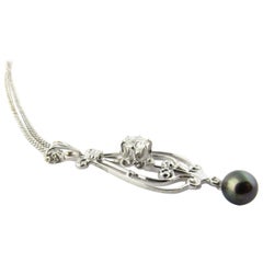 14 Karat White Gold Diamond and Black Pearl Necklace