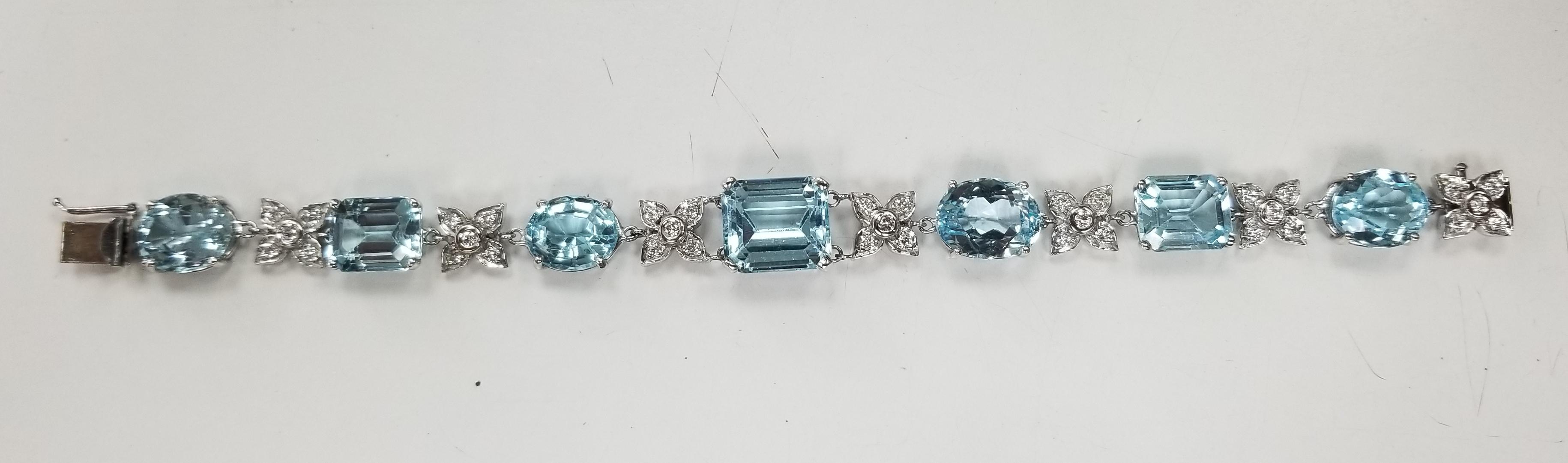 Women's or Men's 14 Karat White Gold Diamond and Blue Topaz Bracelet