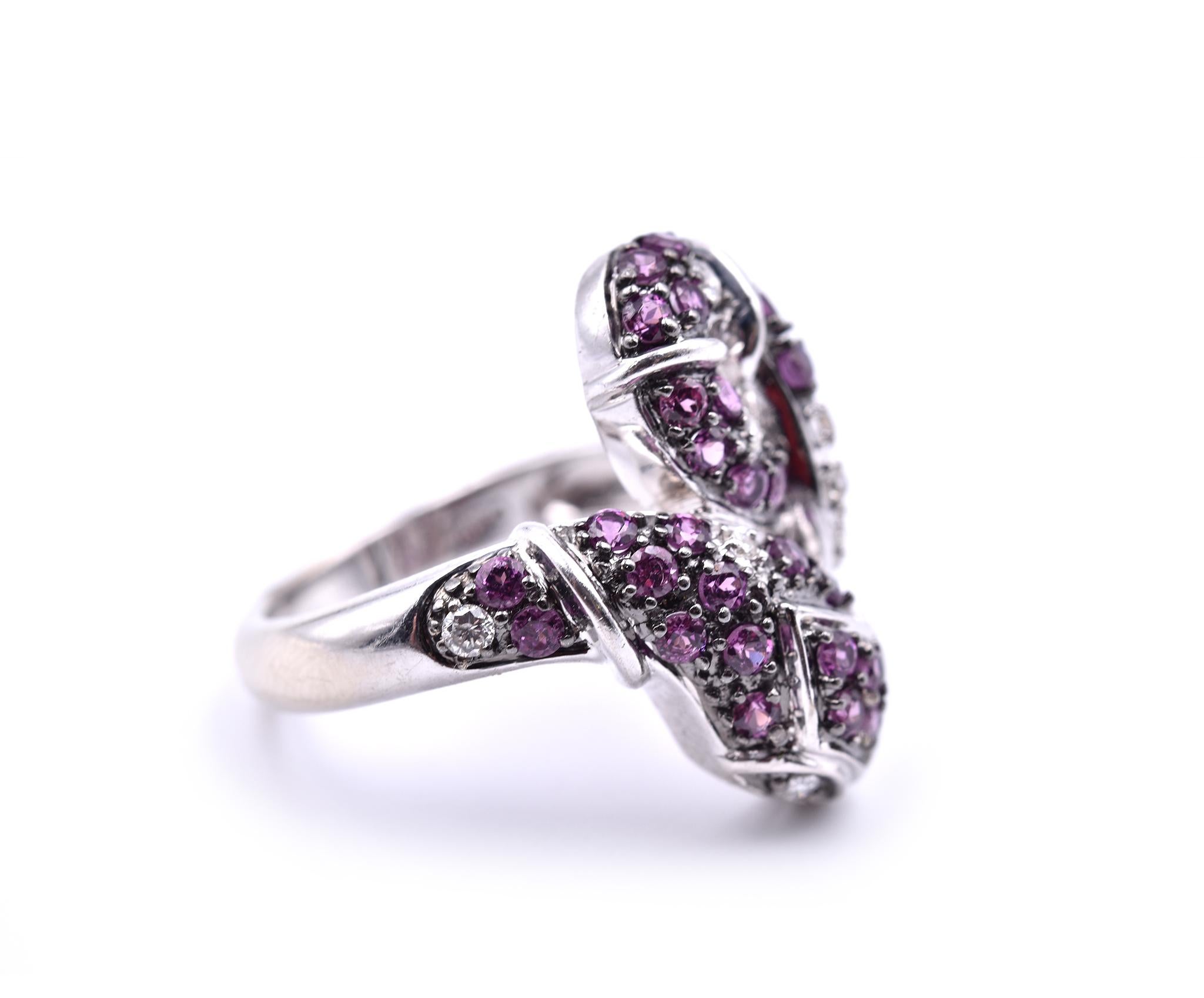 Designer: custom design
Material: 14k white gold
Pink Tourmaline: 29 round cut = .80cttw
Diamonds: 12 round brilliant cut = 0.20cttw
Color: G
Clarity: VS
Ring Size: 6 (please allow two additional shipping days for sizing requests)
Dimensions: ring