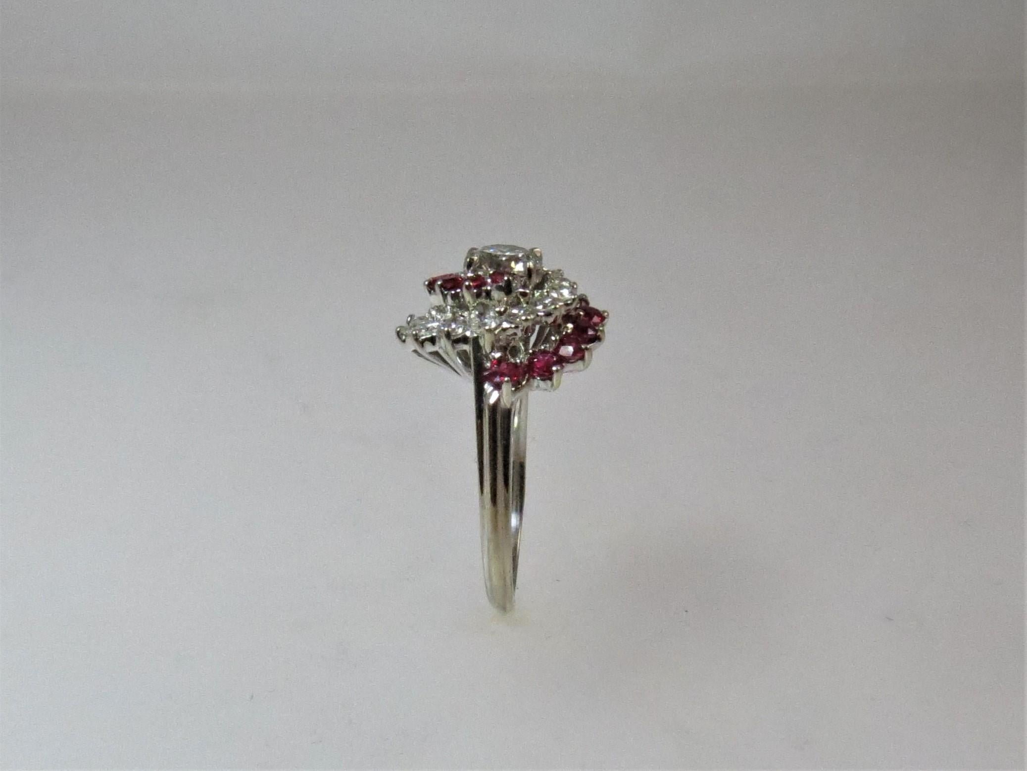 14 Karat White Gold Diamond and Ruby Swirl Design Ring In Excellent Condition For Sale In Chicago, IL