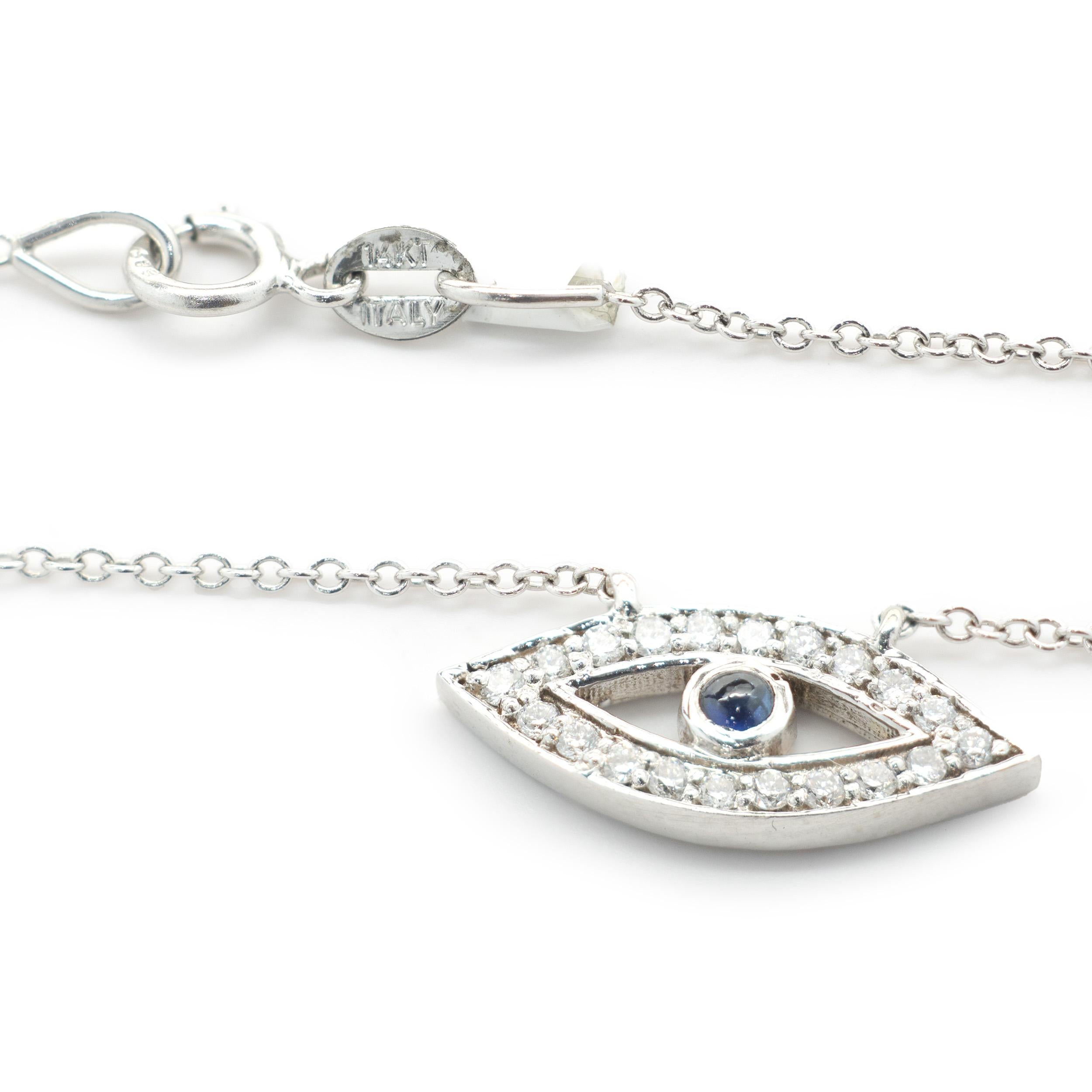 Round Cut 14 Karat White Gold Diamond and Sapphire Evil Eye Necklace For Sale
