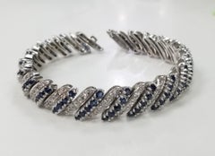 Circa 1960s 14 Karat White Gold Diamond and Sapphire Flexible Bracelet