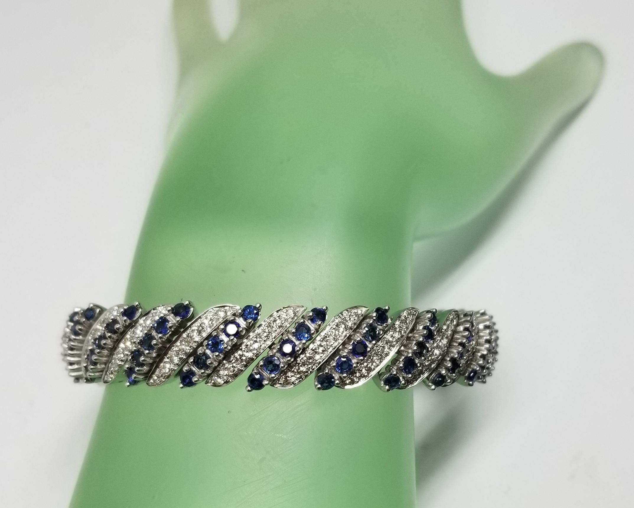 Women's or Men's Circa 1960s 14 Karat White Gold Diamond and Sapphire Flexible Bracelet For Sale