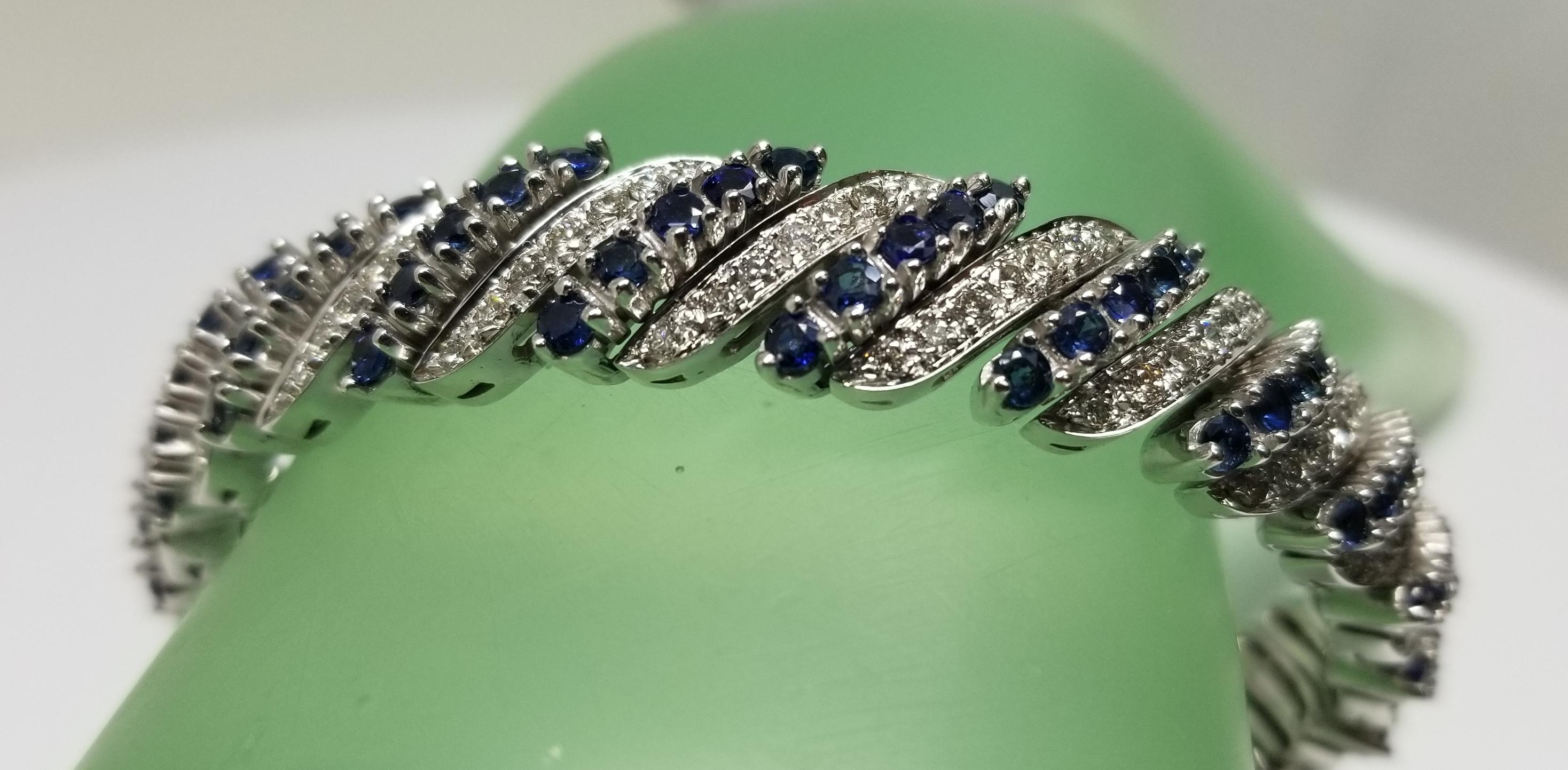 Circa 1960s 14 Karat White Gold Diamond and Sapphire Flexible Bracelet For Sale 1