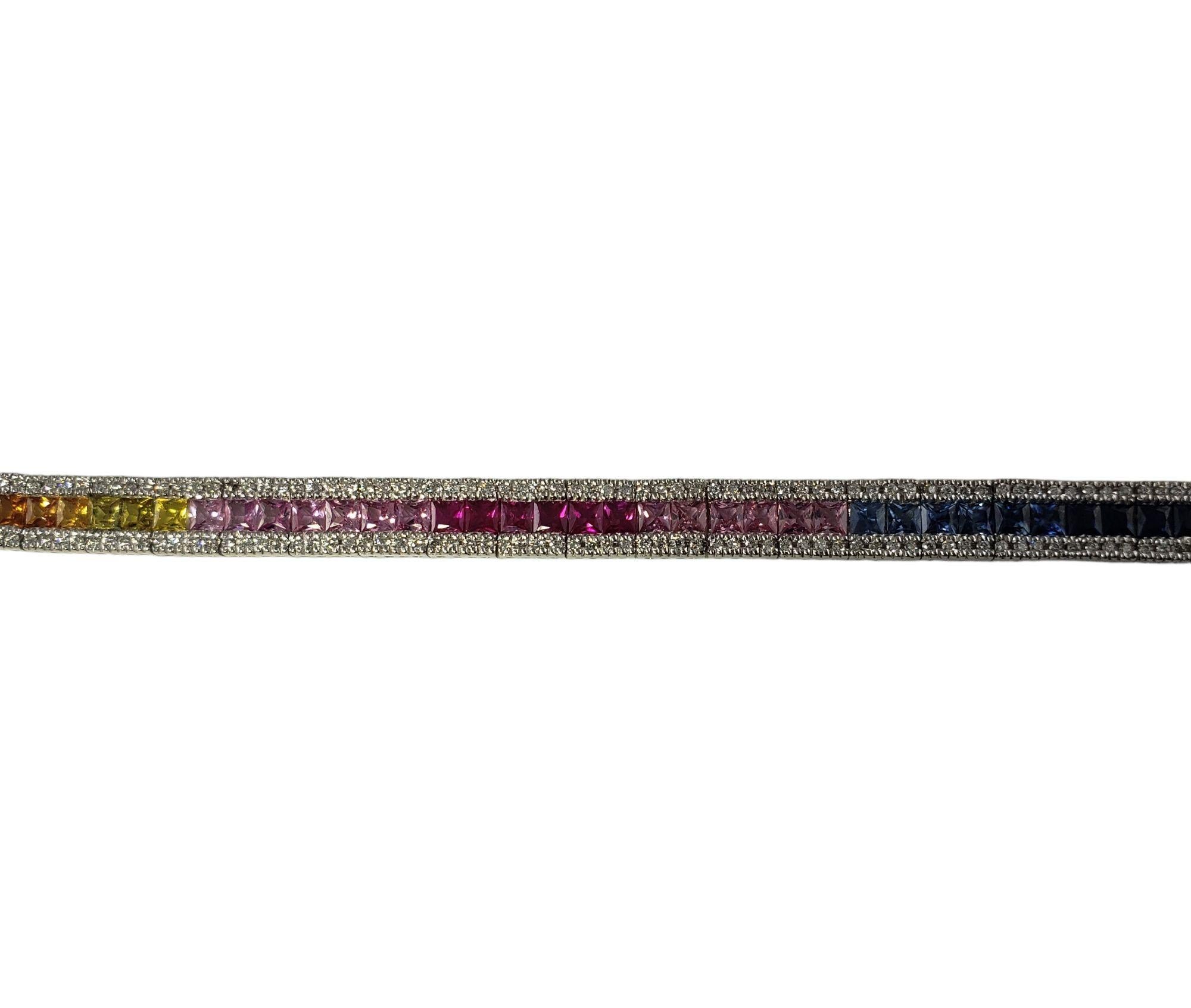Vintage 14 Karat White Gold Diamond and Natural Multi Sapphire Rainbow Style Bracelet JAGi Certified-

This lovely bracelet features 274 round brilliant cut diamonds and 69 French cut natural sapphires set in 14K white gold.
Width: 6 mm.

Total