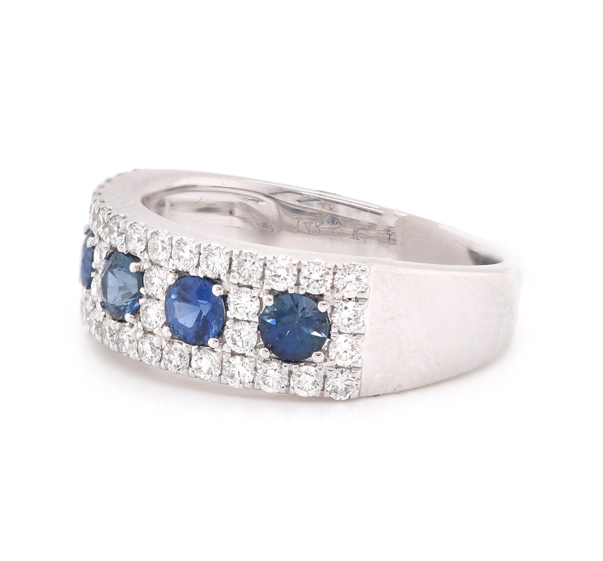 Designer: custom design
Material: 14K white gold
Diamond: 44 round cut = .64cttw
Color: G
Clarity: VS2
Sapphire: 5 round cut = .74cttw
Dimensions: ring top measures 6.4mm wide
Ring Size: 6.5 (please allow two extra shipping days for sizing requests)