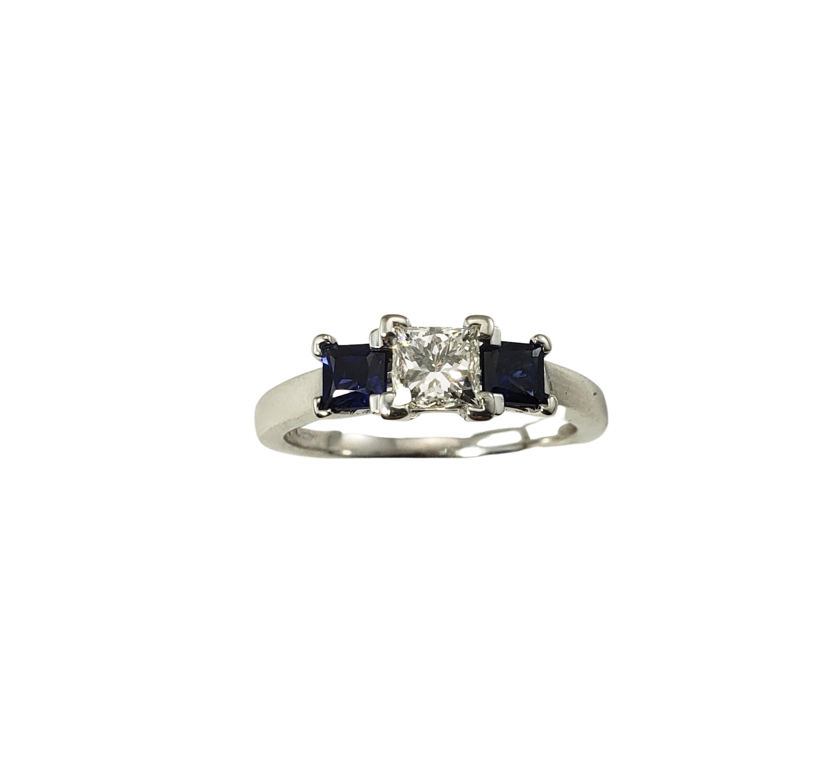 14 Karat White Gold Diamond and Sapphire Ring Size 7 GAI Certified-

This stunning ring features one princess cut diamond and two princess cut sapphires set in classic 14K white gold.  Shank: 2 mm.

Total sapphire weight:  .64 ct.

Total diamond