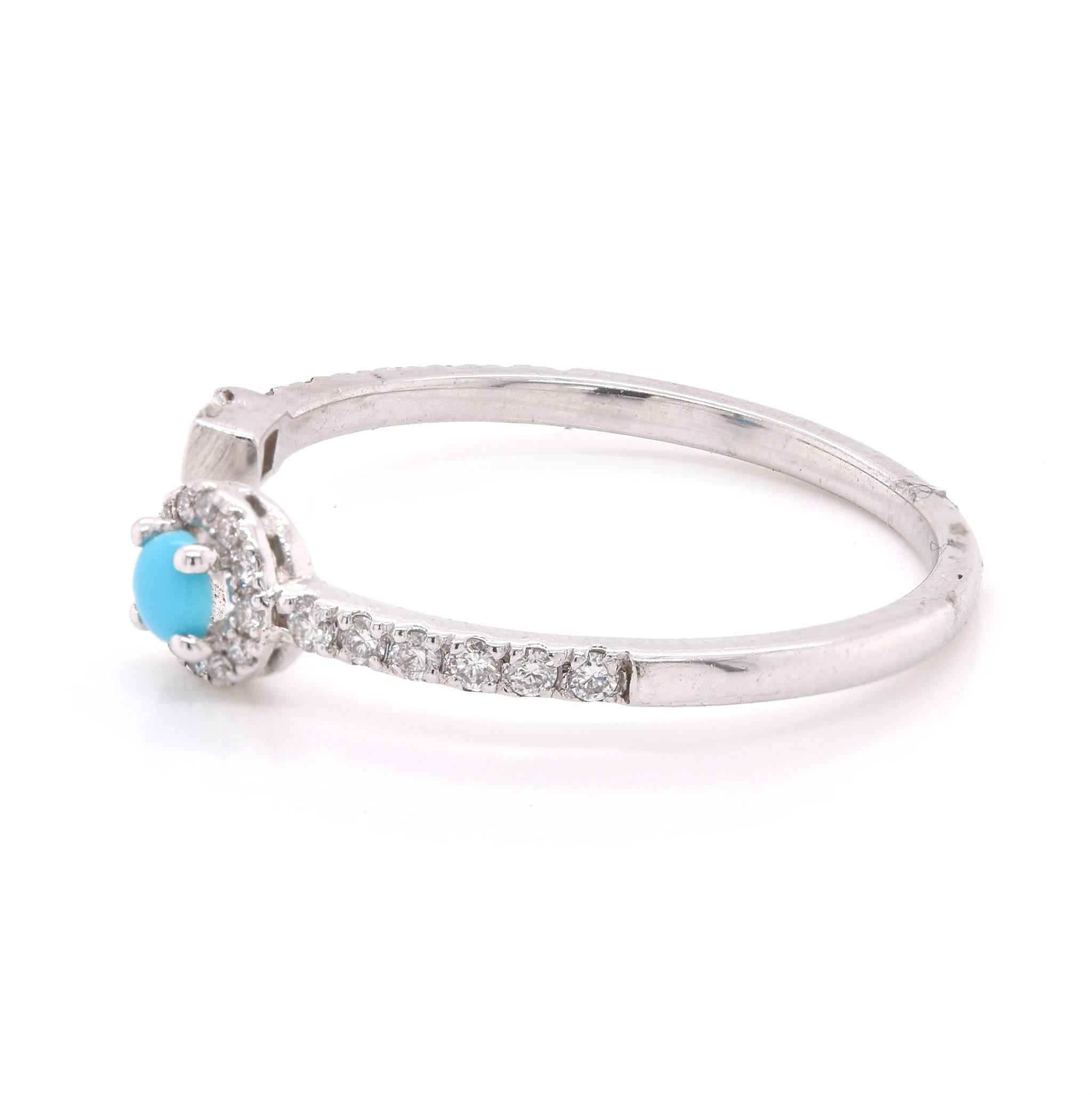 Designer: custom 
Material: 14K white gold
Gemstone: Turquoise round=.07ct
Diamonds: 27 round brilliant cut= .25cttw
Color: G
Clarity: VS
Ring Size: 7
Dimensions: ring is 1.5-2.5mm wide
Weight: 1.37 grams

