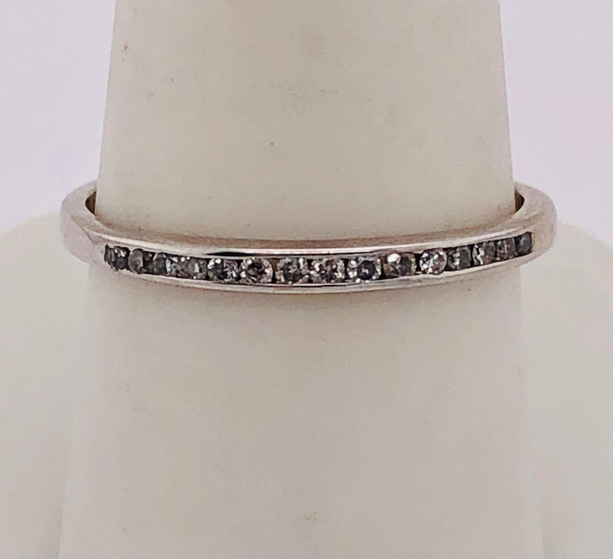 14 Karat White Gold Band/Bridal Ring with Diamonds
0.16 Total Diamond Weight
Size 8.75
2.0 grams Total Weight.