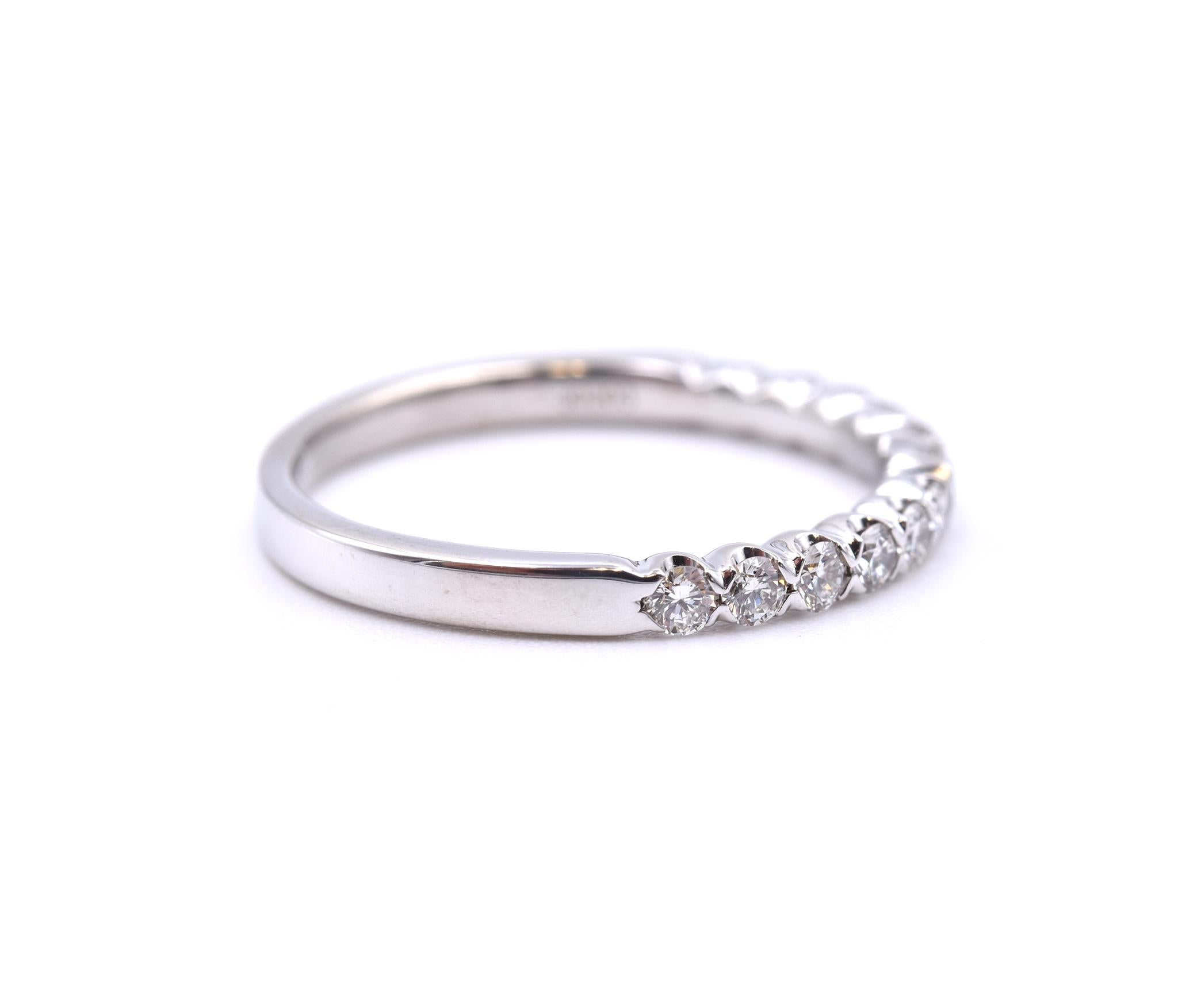 Material: 14K white gold 
Diamonds: 12 round brilliant cut = .42cttw
Color: G
Clarity: VS2
Ring Size: 6 (please allow up to 2 additional business days for sizing requests)
Dimensions: ring measures 2.1mm wide
Weight: 1.90 grams
