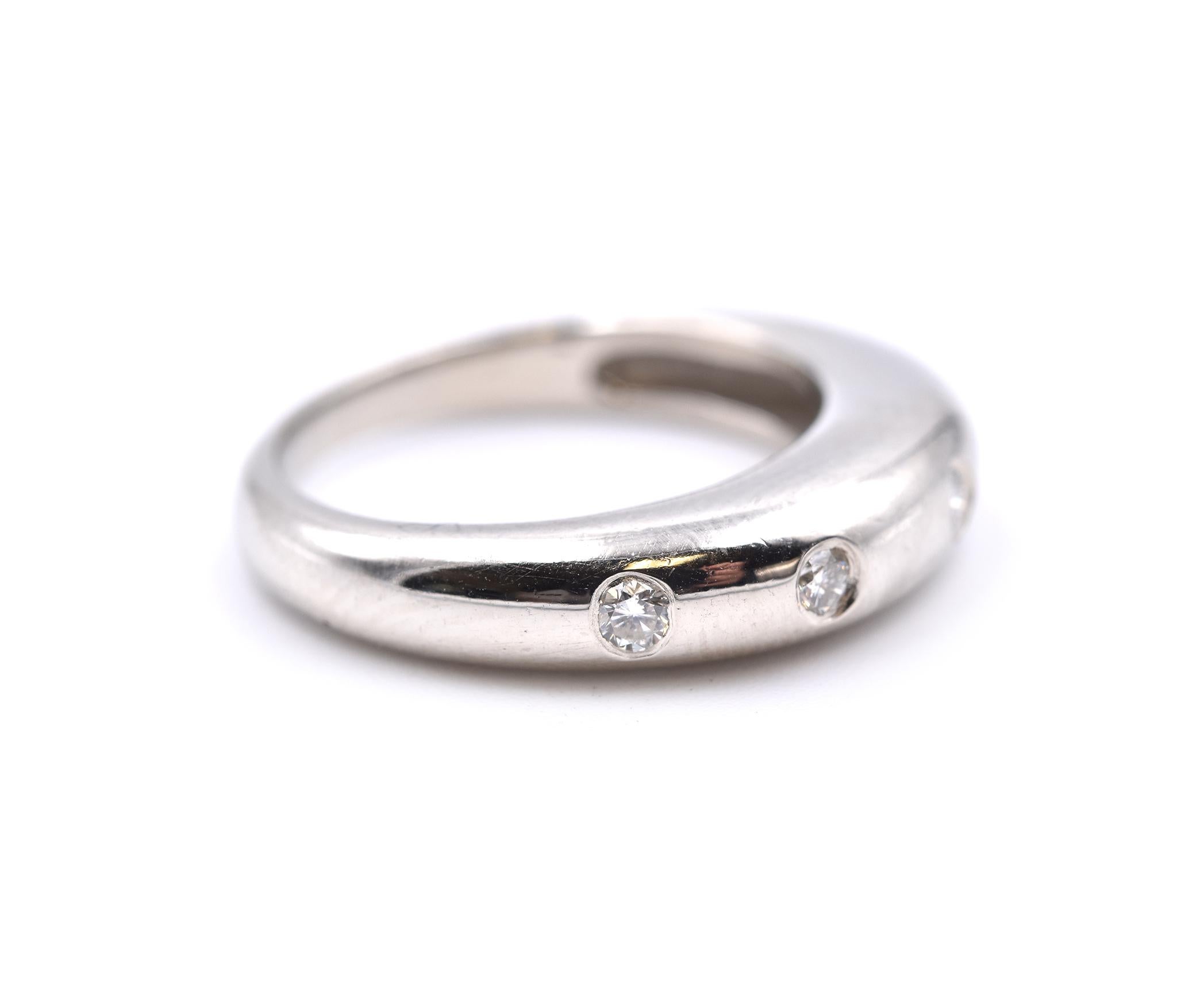 Material: 14K white gold 
Diamonds: 5 round brilliant cut = .25cttw
Color: H
Clarity: SI1
Ring Size: 5 (please allow up to 2 additional business days for sizing requests)
Dimensions: ring measures 4.6mm wide
Weight: 4.77 grams
