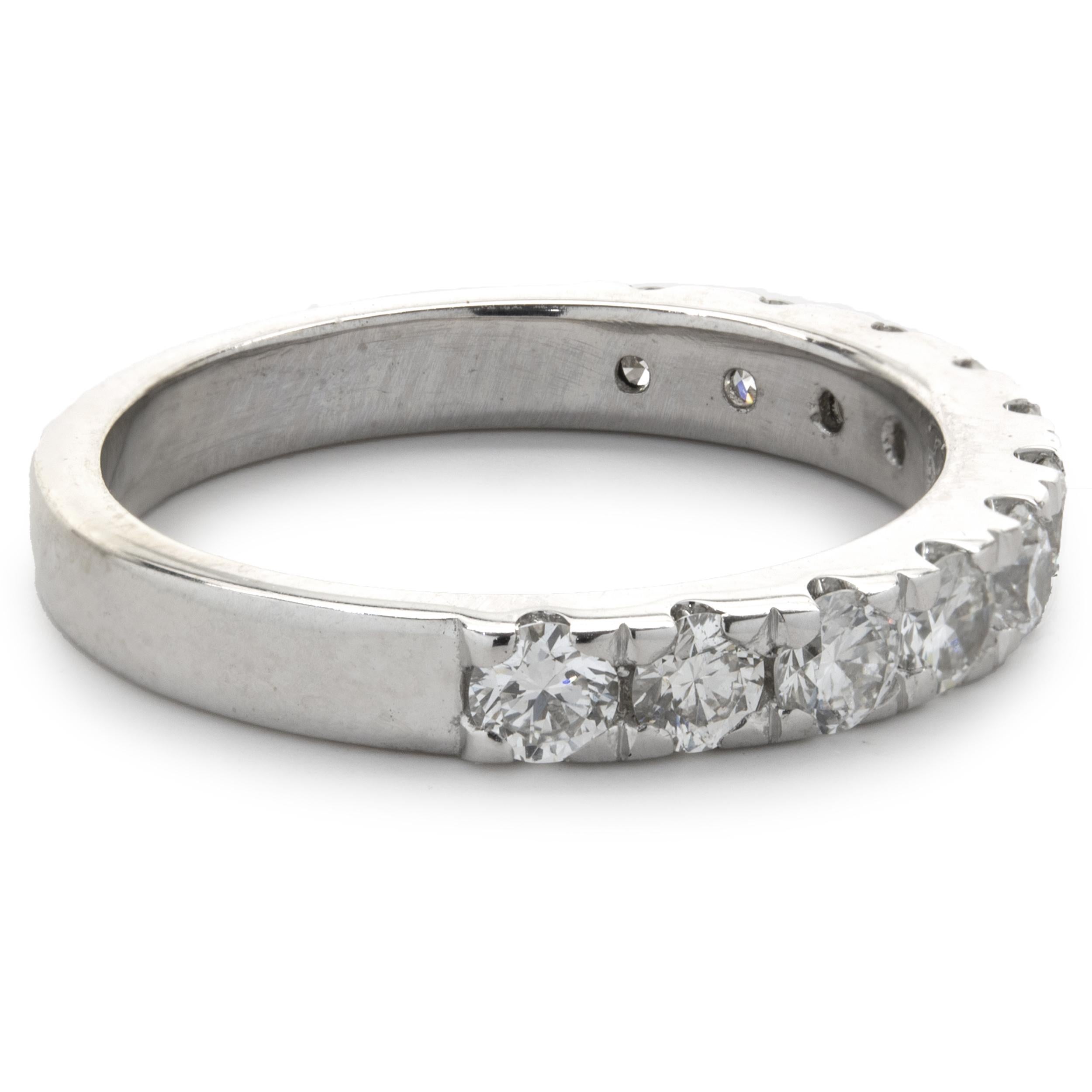 Designer: custom
Material: 14K white gold
Diamond: 11 round brilliant cut = 0.80cttw
Color: G
Clarity: SI1
Ring size: 5.25 (please allow two additional shipping days for sizing requests)
Weight: 2.63 grams
