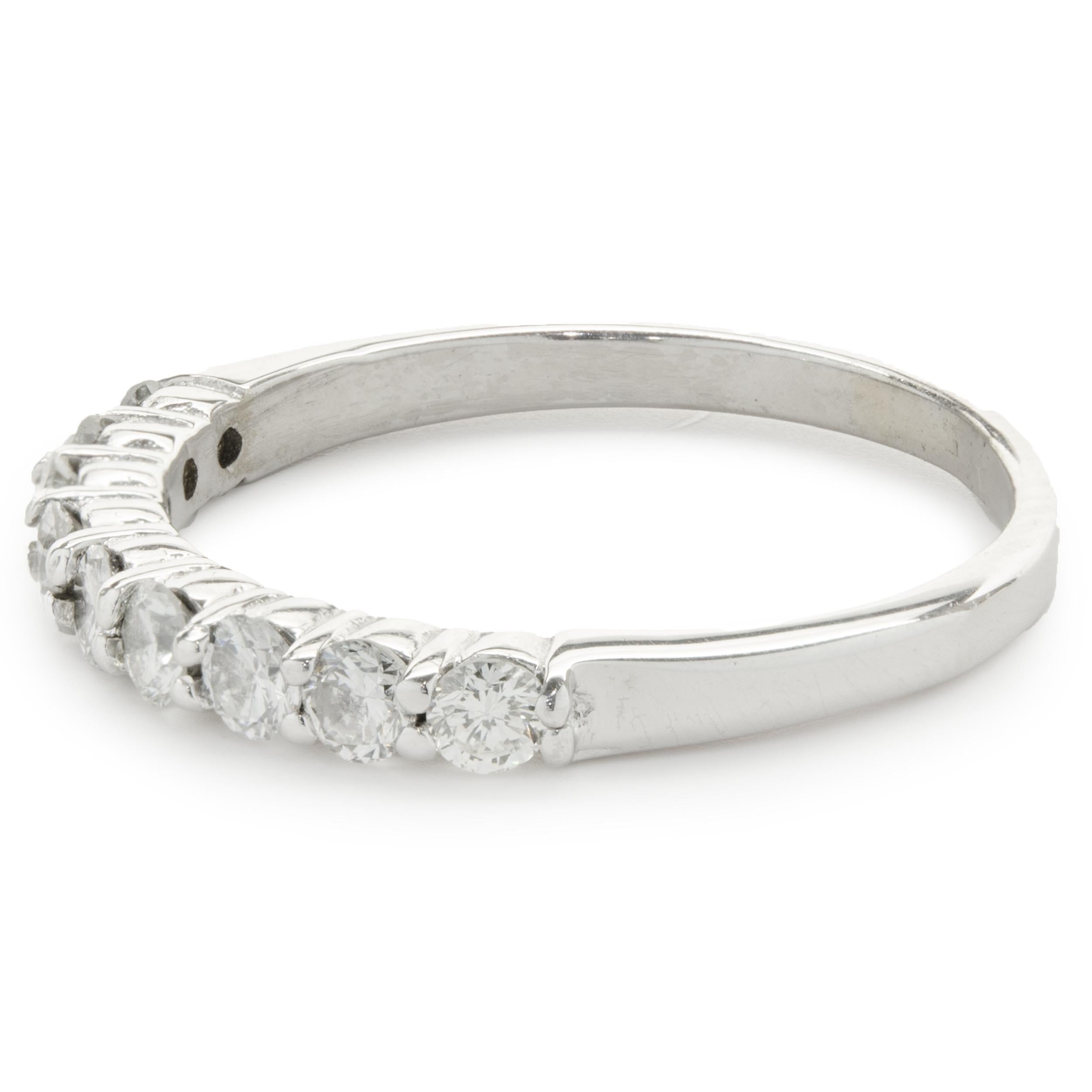 Designer: custom
Material: 14K white gold
Diamond: 9 round brilliant cut = .54cttw
Color: I
Clarity: SI1
Size: 7 complimentary sizing available 
Weight: 2.22 grams
