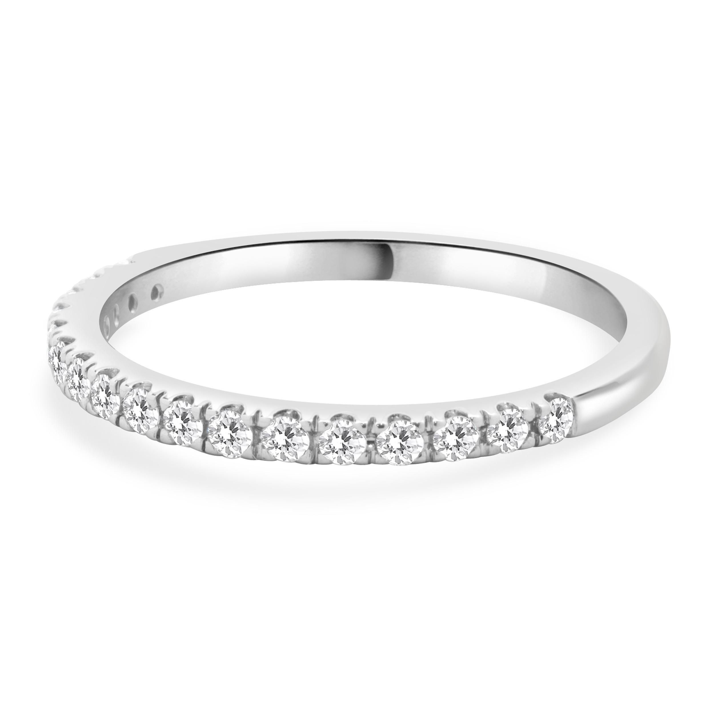 
Designer: Custom
Material: 14K white gold
Diamonds: 17 round brilliant cut = 0.25cttw
Color: G
Clarity: VS1-2
Size: 7 sizing available 
Dimensions: ring measures 2mm in width
Weight: 1.76 grams
