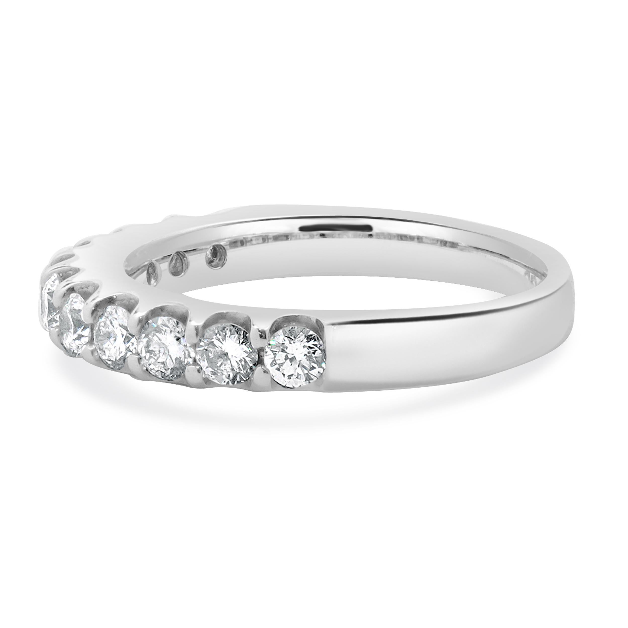 Designer: custom
Material: 14K white gold
Diamond: 11 round brilliant cut = 0.66cttw
Color: H
Clarity: SI2-I1
Ring size: 6.5 (please allow two additional shipping days for sizing requests)
Weight: 3.94 grams