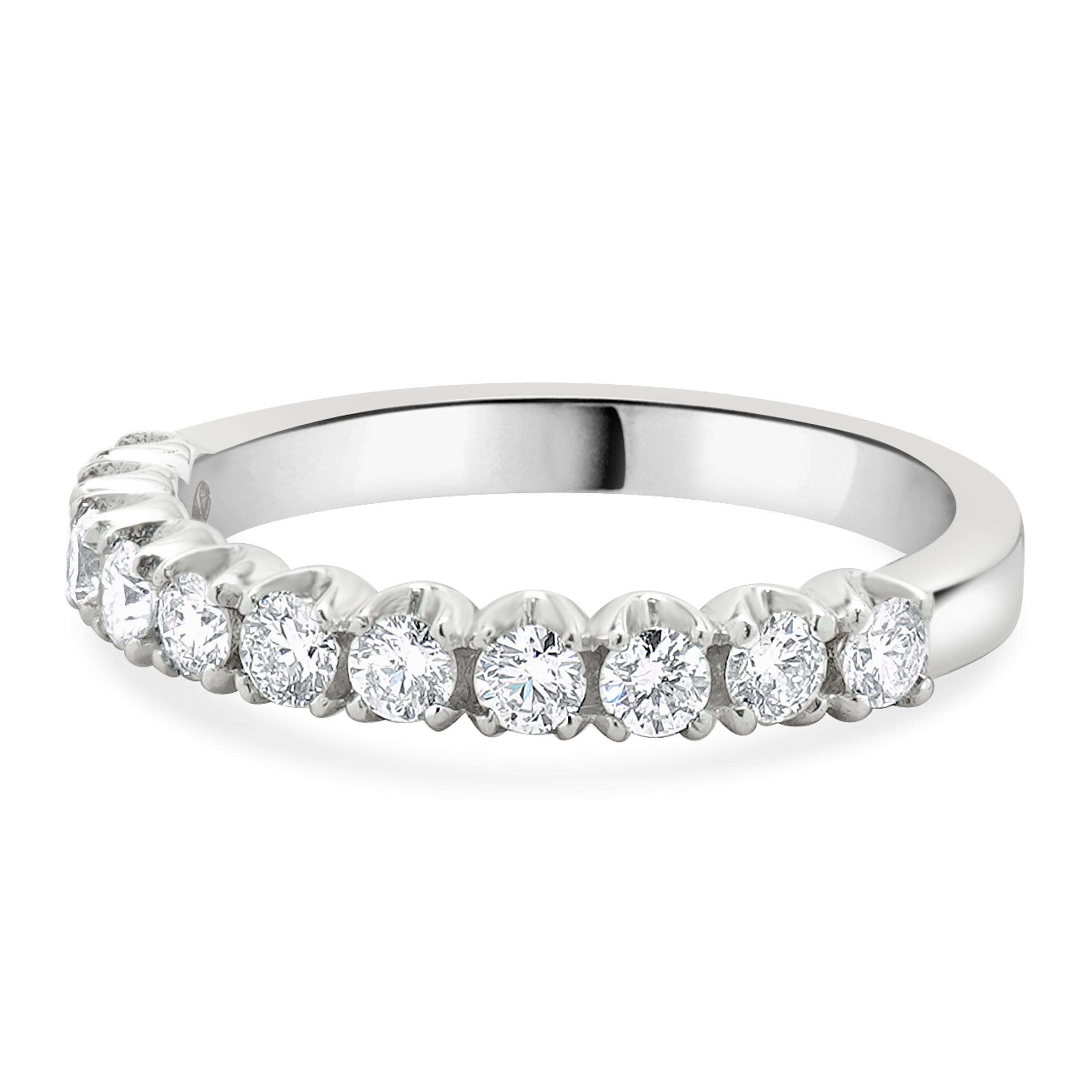 Designer: custom
Material: 14K white gold
Diamond:  round brilliant cut = 0.72cttw
Color: G
Clarity: SI1
Ring size: 6.75 (please allow two additional shipping days for sizing requests)
Weight: 2.75 grams