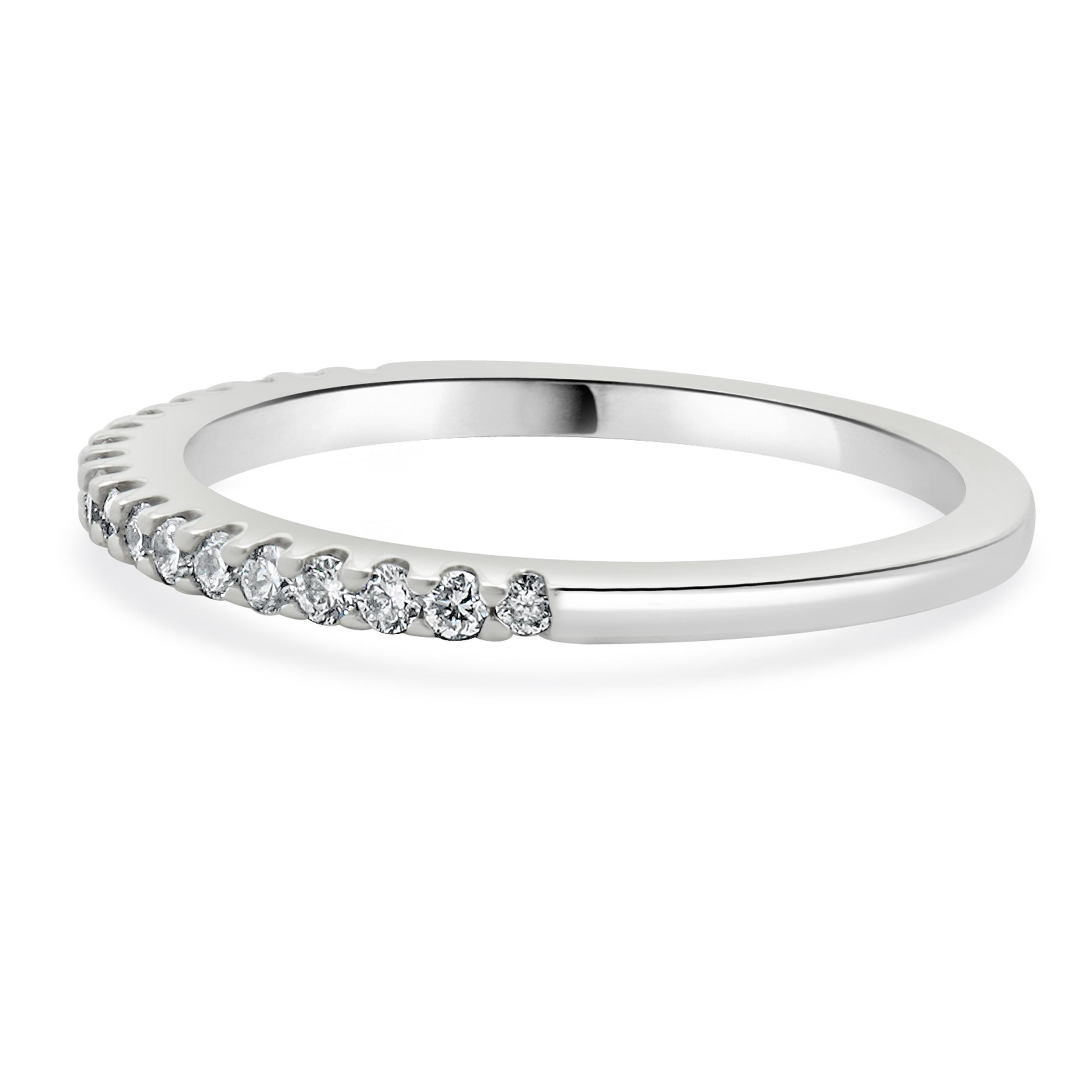 Designer: custom
Material: 14K white gold
Diamond: 19 round brilliant cut = 0.20cttw
Color: H
Clarity: SI1-2
Ring size: 6.25 (please allow two additional shipping days for sizing requests)
Weight: 1.89 grams