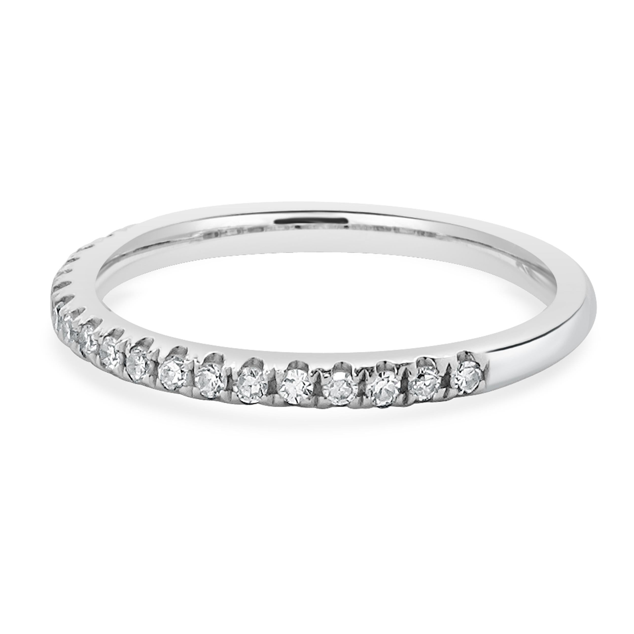 Designer: custom
Material: 14K white gold
Diamond: 20 round = 0.16cttw
Color: H
Clarity: SI1-2
Ring size: 5 (please allow two additional shipping days for sizing requests)
Weight: 1.52 grams
