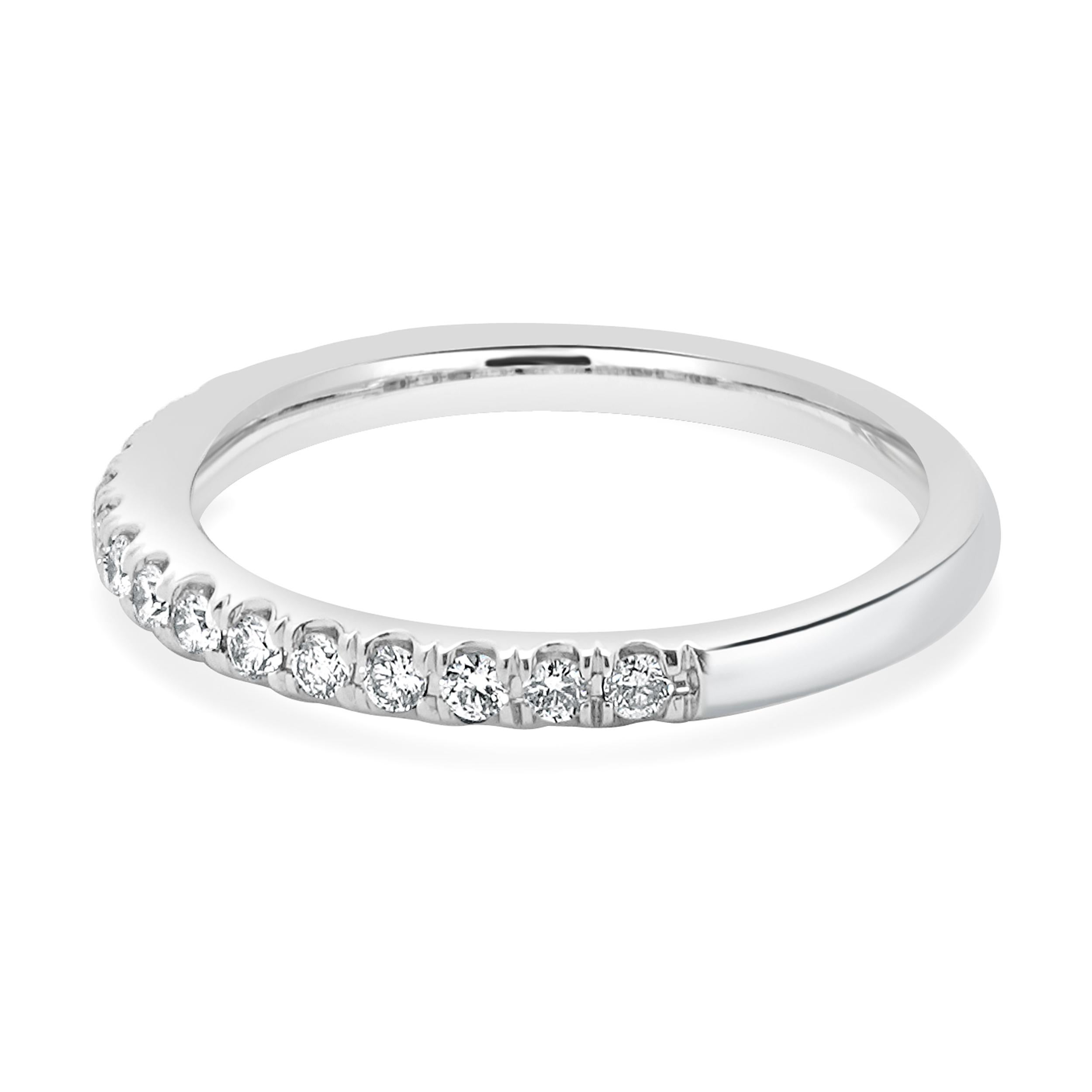 Designer: custom
Material: 14K white gold
Diamond: 17 round brilliant cut = 0.34cttw
Color: H
Clarity: SI2
Ring size: 7 (please allow two additional shipping days for sizing requests)
Weight: 2.90 grams
