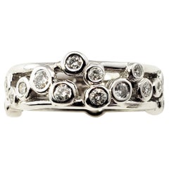 Anello a fascia con diamanti in oro bianco 14 carati