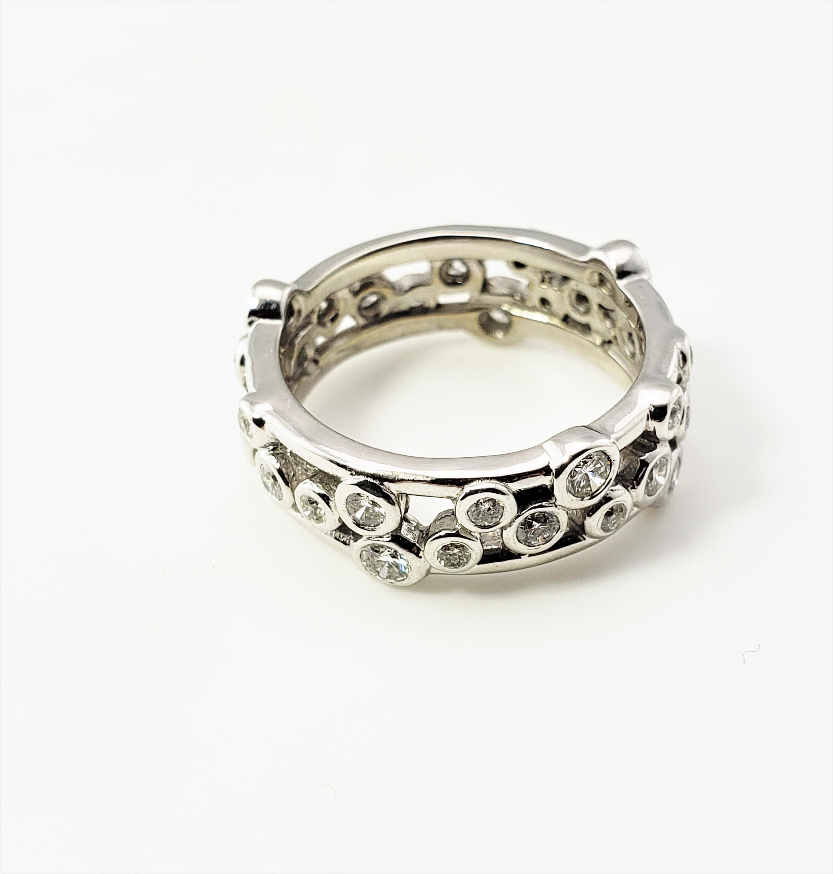 14 Karat White Gold and Diamond Band Ring Size 6-

This lovely band features 32 round brilliant cut bezel set diamonds in beautifully detailed 14K white gold.  Width:  7 mm.

Approximate total diamond weight:  .75 ct.

Diamond color:  I-K

Diamond